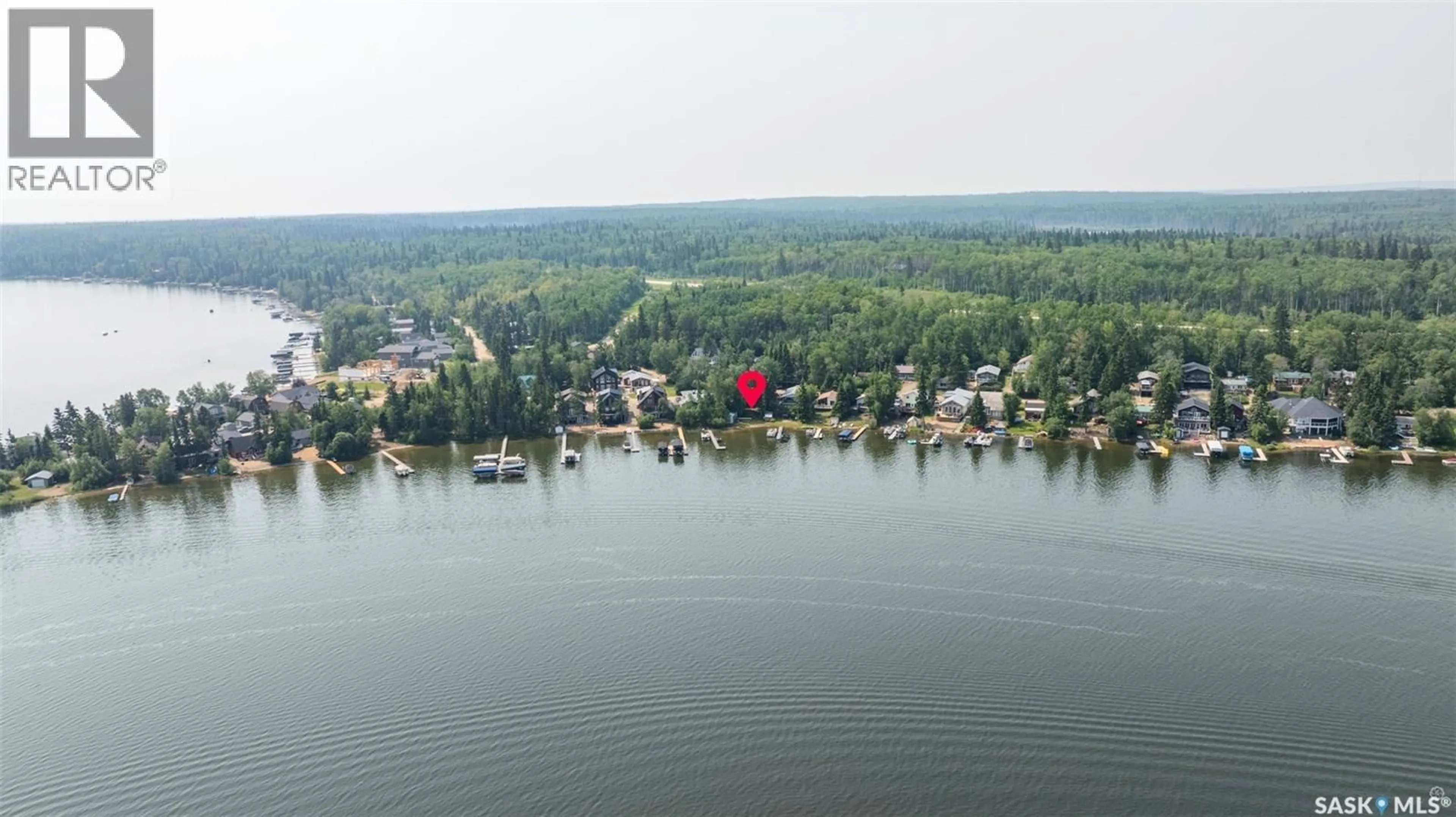 A pic from outside/outdoor area/front of a property/back of a property/a pic from drone, water/lake/river/ocean view for 201 AGNES STREET, Lakeland Rm No. 521 Saskatchewan S0J0N0