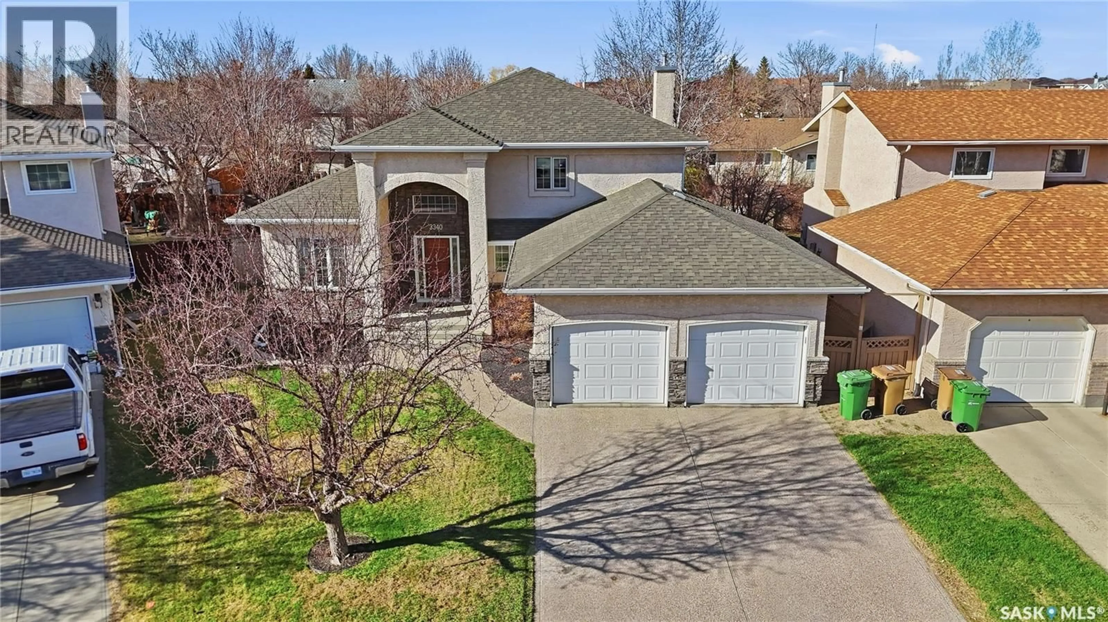 A pic from outside/outdoor area/front of a property/back of a property/a pic from drone, street for 3340 ASHLEY PLACE, Regina Saskatchewan S4V2T8