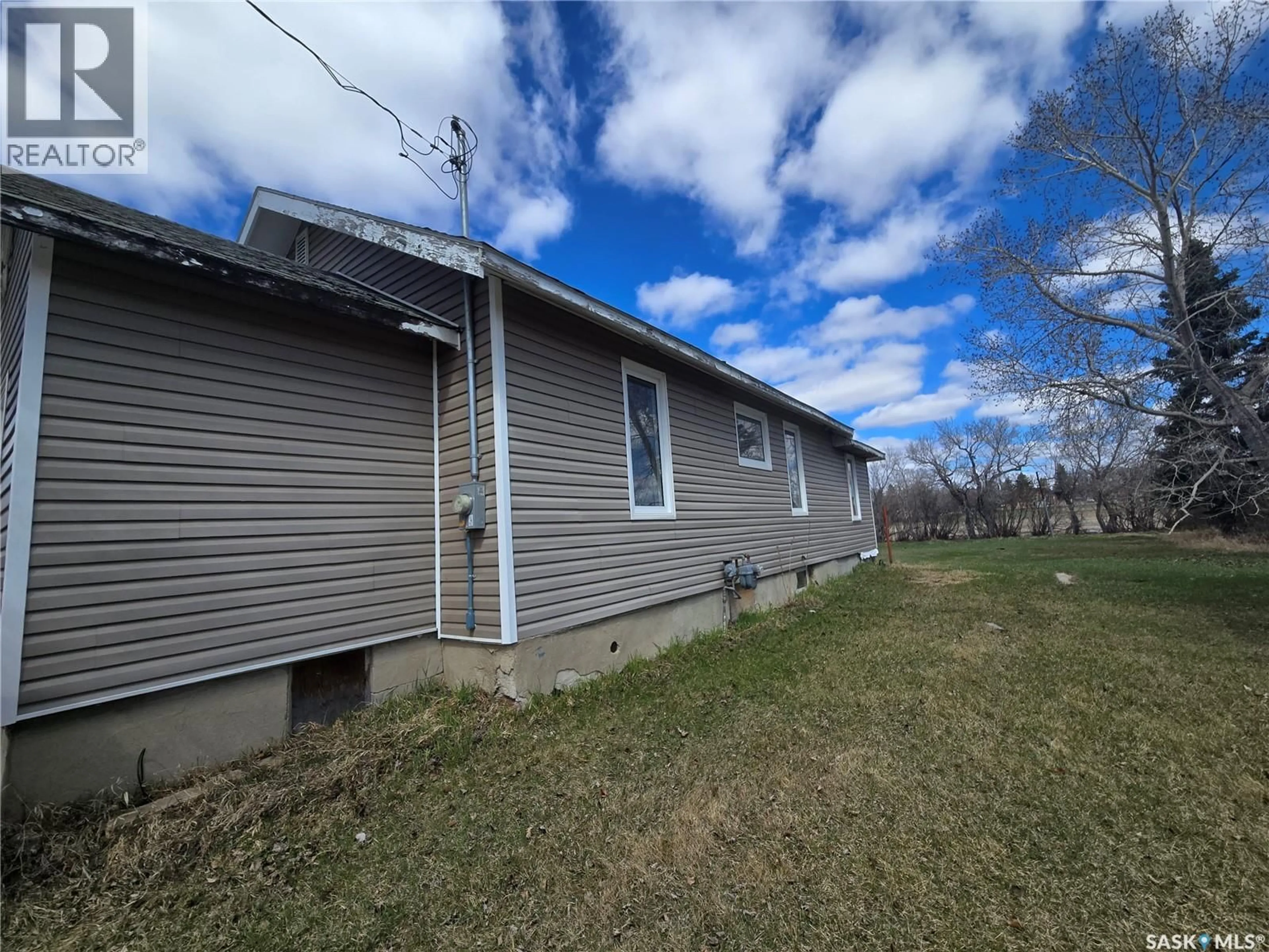 A pic from outside/outdoor area/front of a property/back of a property/a pic from drone, building for 601 SOURIS AVENUE, Arcola Saskatchewan S0C0G0