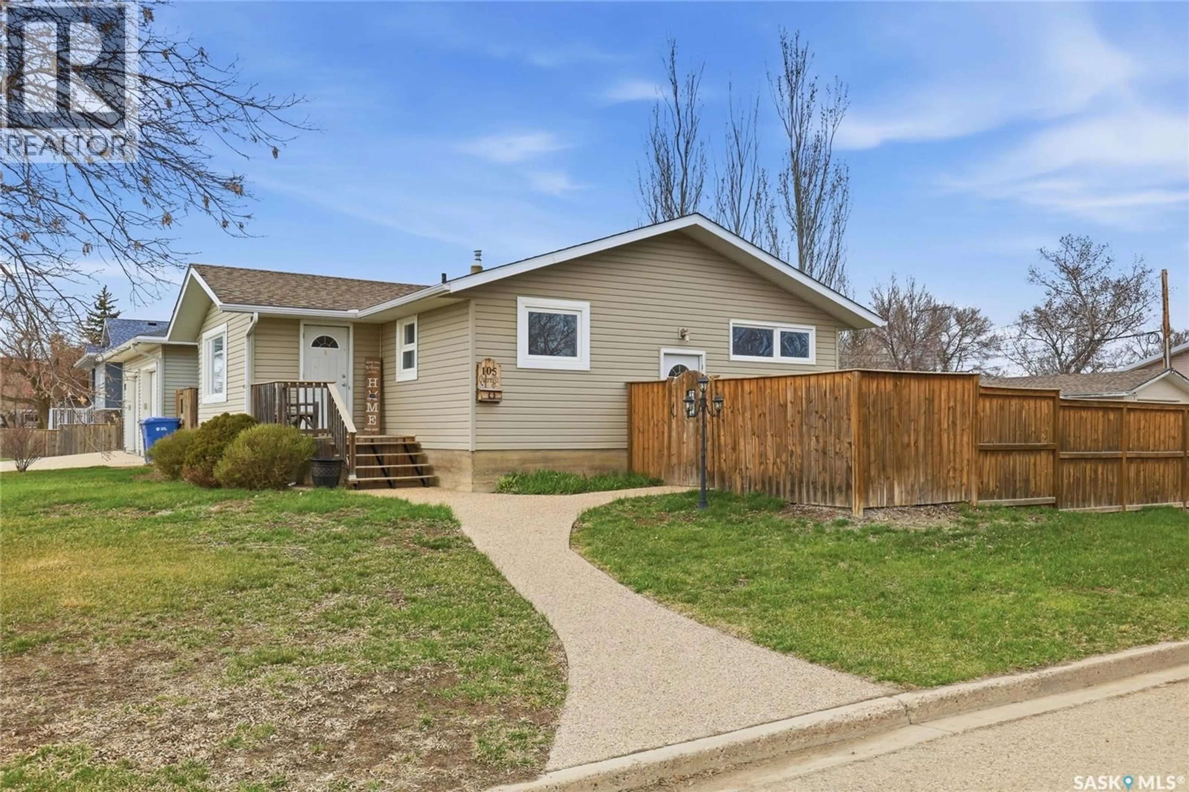 Home with vinyl exterior material, street for 105 QUEEN STREET, Milestone Saskatchewan S0G3L0