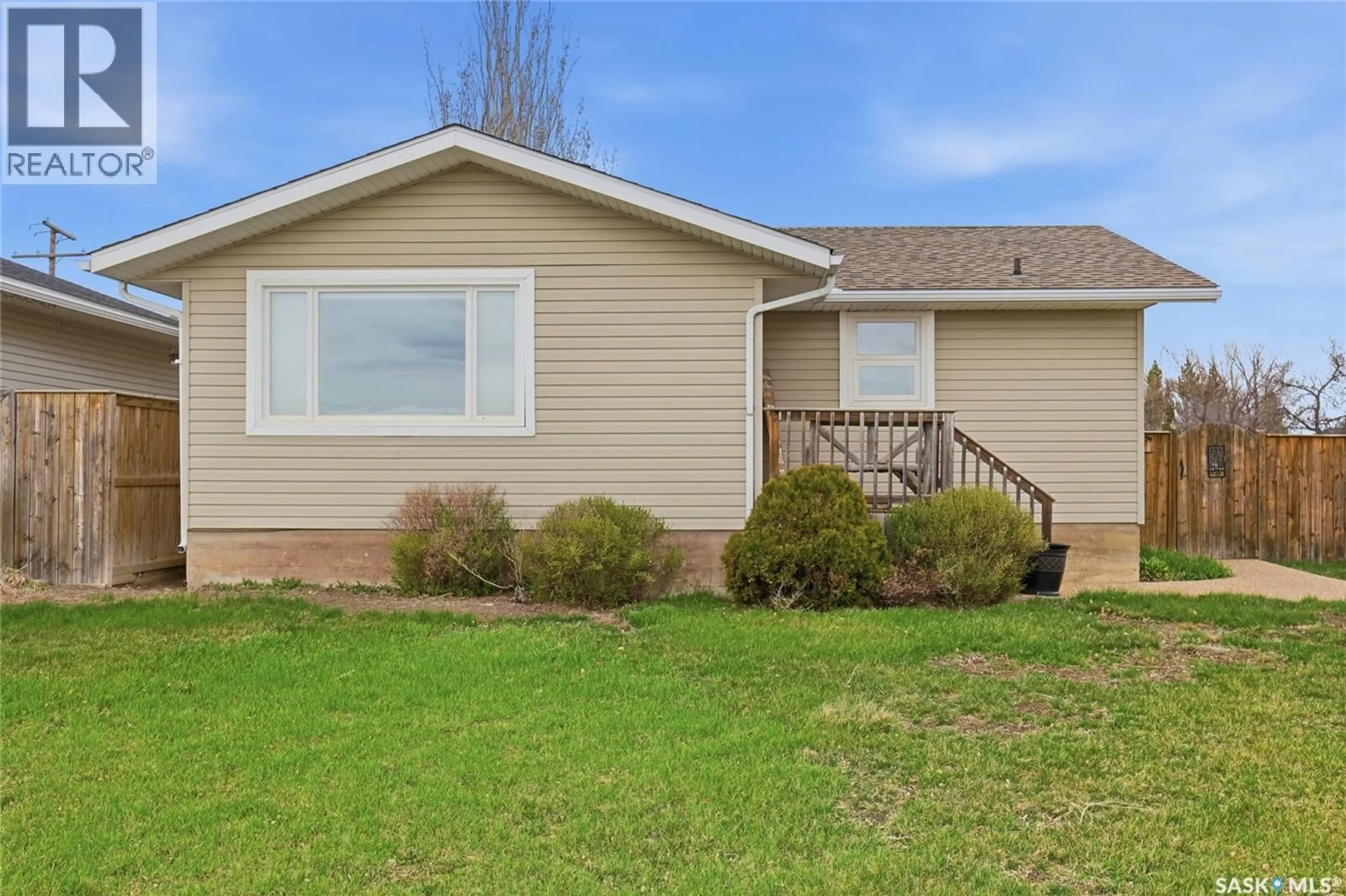 Home with vinyl exterior material, street for 105 QUEEN STREET, Milestone Saskatchewan S0G3L0