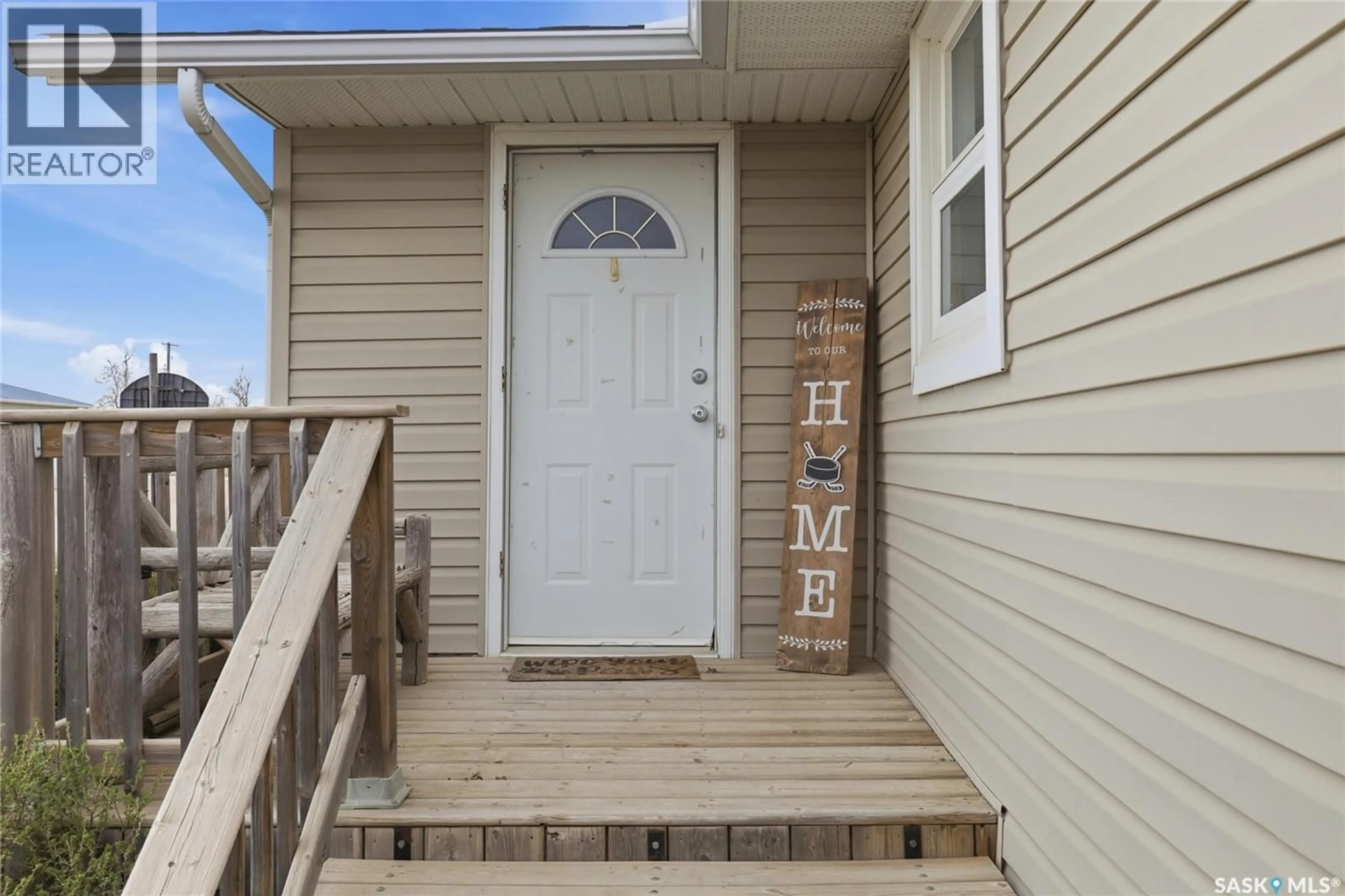 Home with vinyl exterior material, street for 105 QUEEN STREET, Milestone Saskatchewan S0G3L0