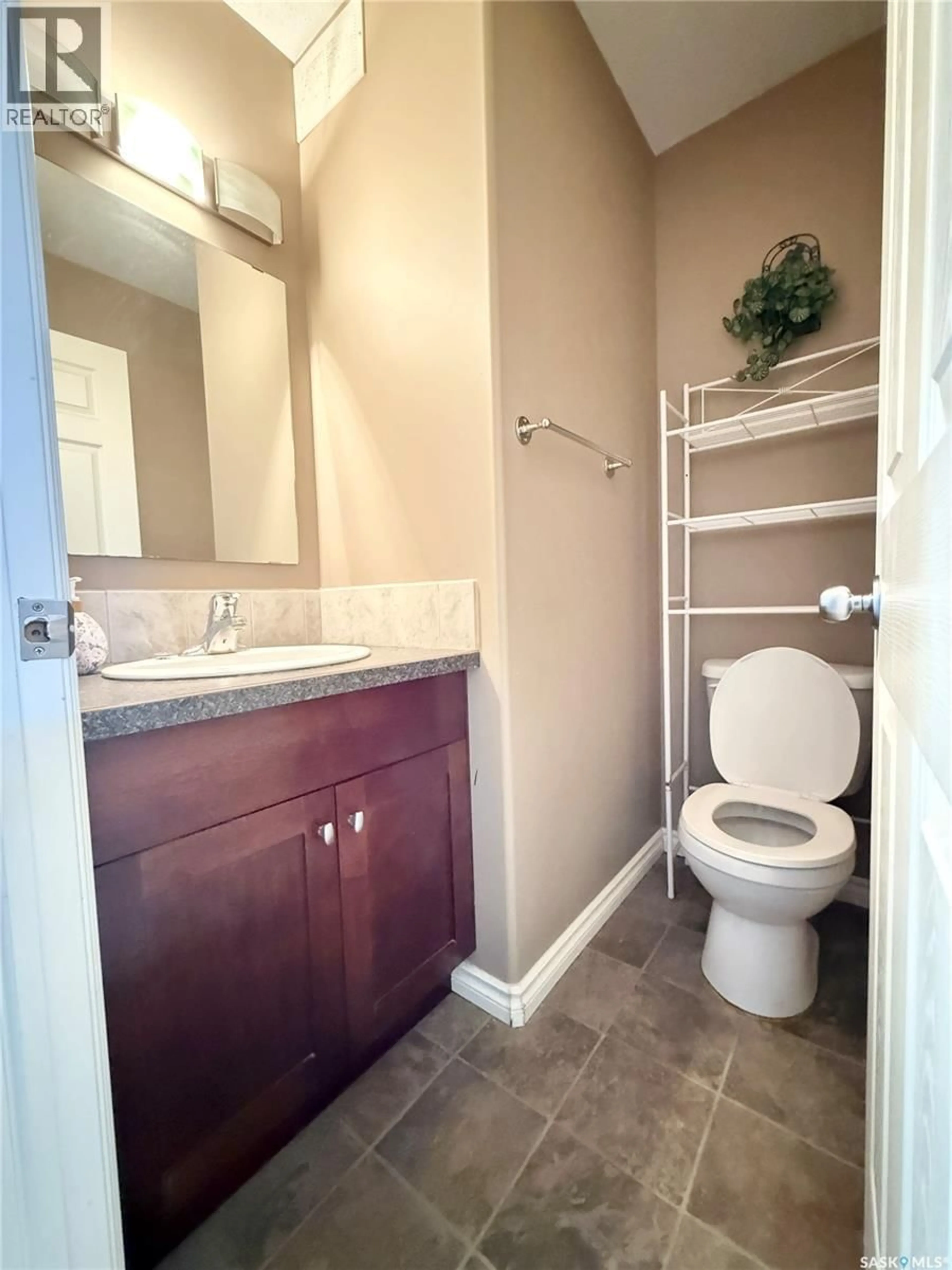 Standard bathroom, ceramic/tile floor for 602 BARBER CRESCENT, Weyburn Saskatchewan S4H0M9