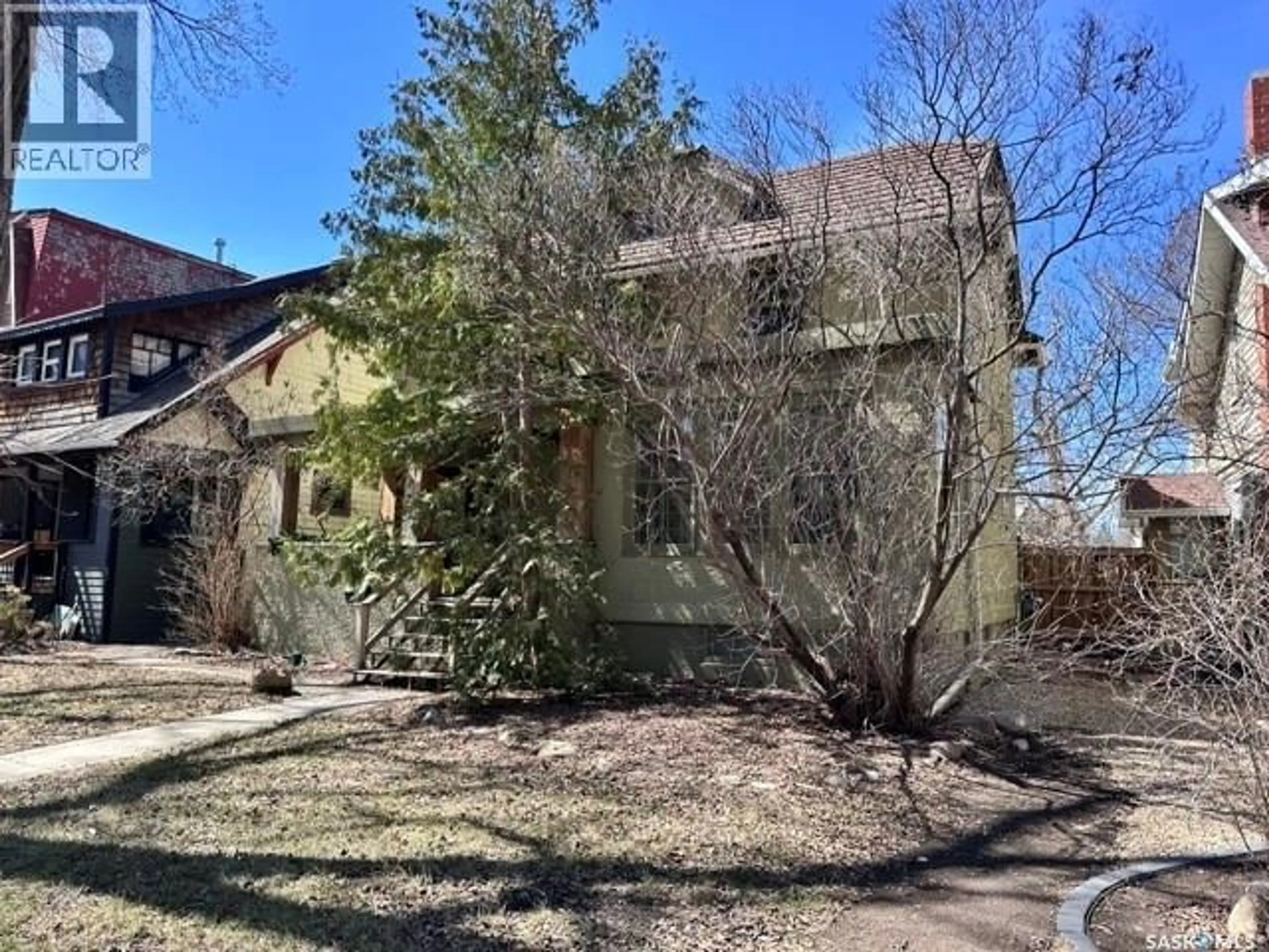 A pic from outside/outdoor area/front of a property/back of a property/a pic from drone, street for 21 ANGUS CRESCENT, Regina Saskatchewan S4T6N1