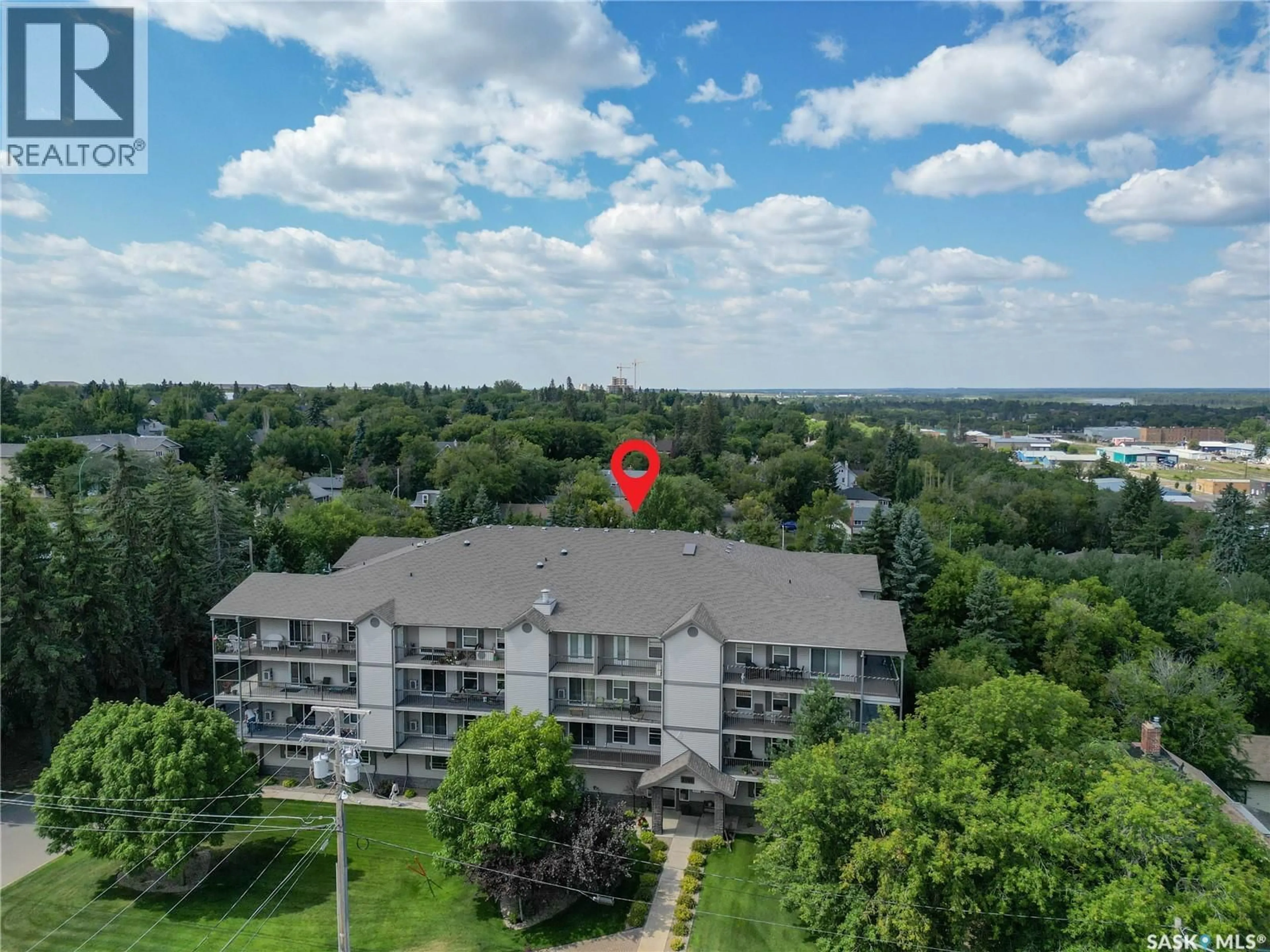A pic from outside/outdoor area/front of a property/back of a property/a pic from drone, city buildings view from balcony for 1 1/2 - 201 1901 1 AVENUE W, Prince Albert Saskatchewan S6V5A8