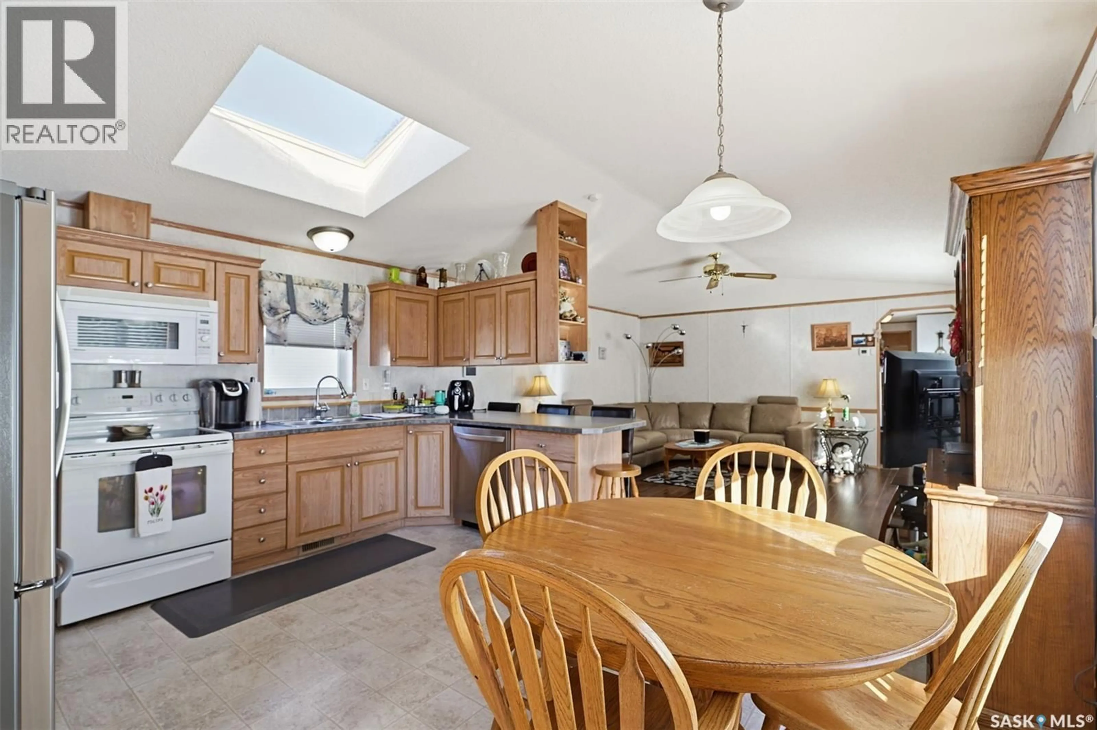 Open concept kitchen, ceramic/tile floor for 200 CYPRESS WAY, Blucher Rm No. 343 Saskatchewan S7B0A4