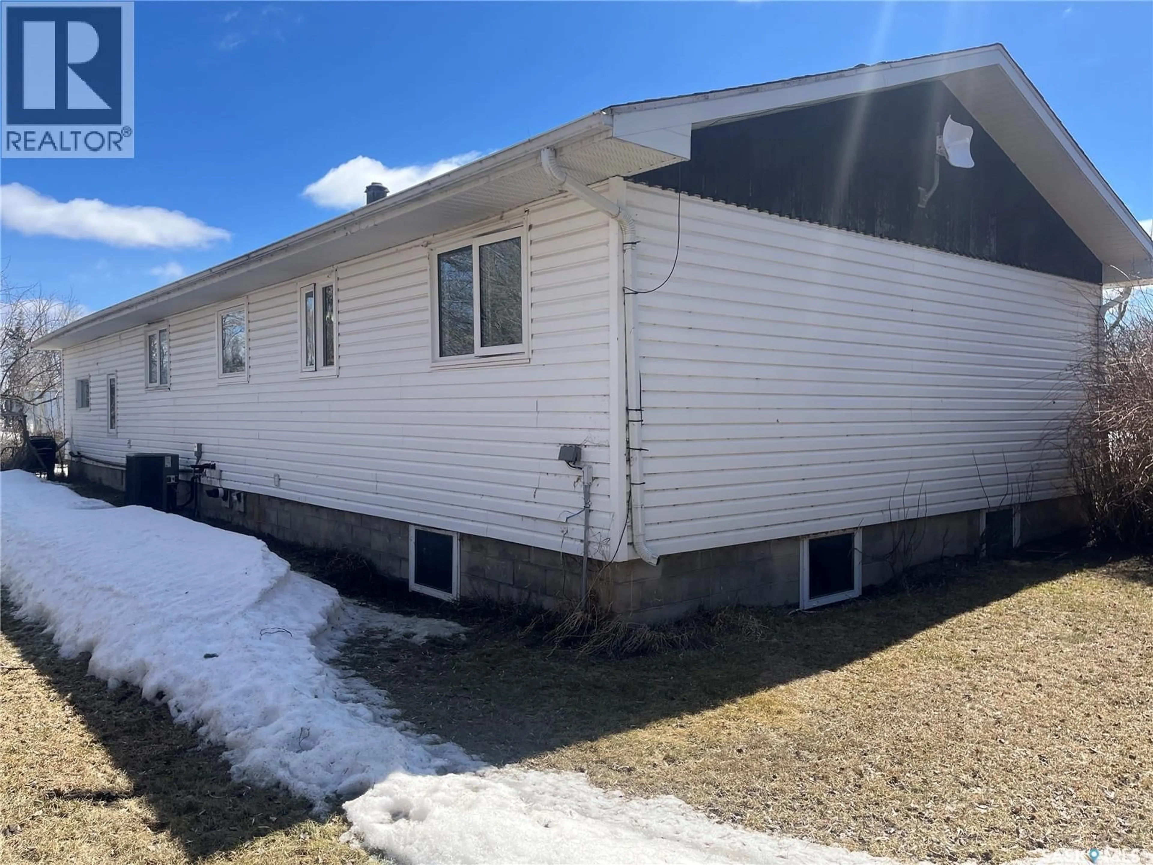 Home with vinyl exterior material, building for HOODOO ACREAGE, Hoodoo Rm No. 401 Saskatchewan S0K1B0