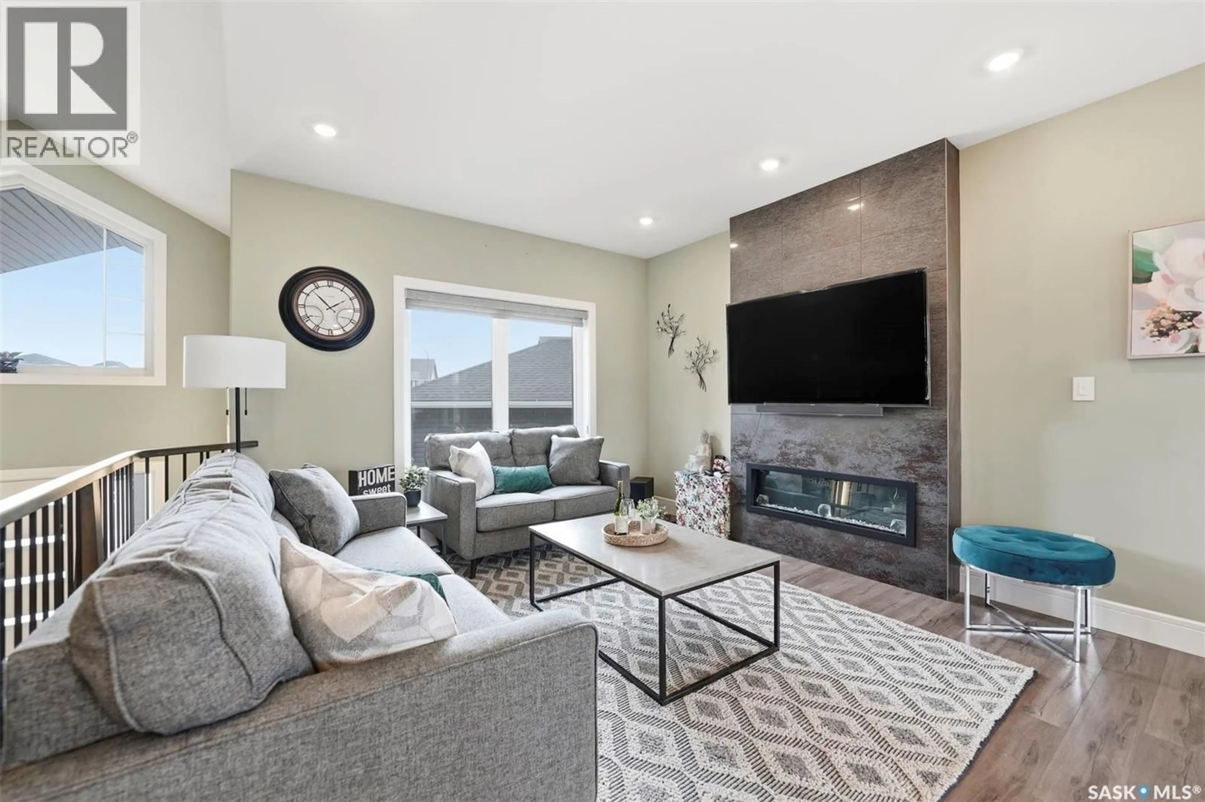 Living room with furniture, unknown for 211 BURGESS BAY, Saskatoon Saskatchewan S7V0S3