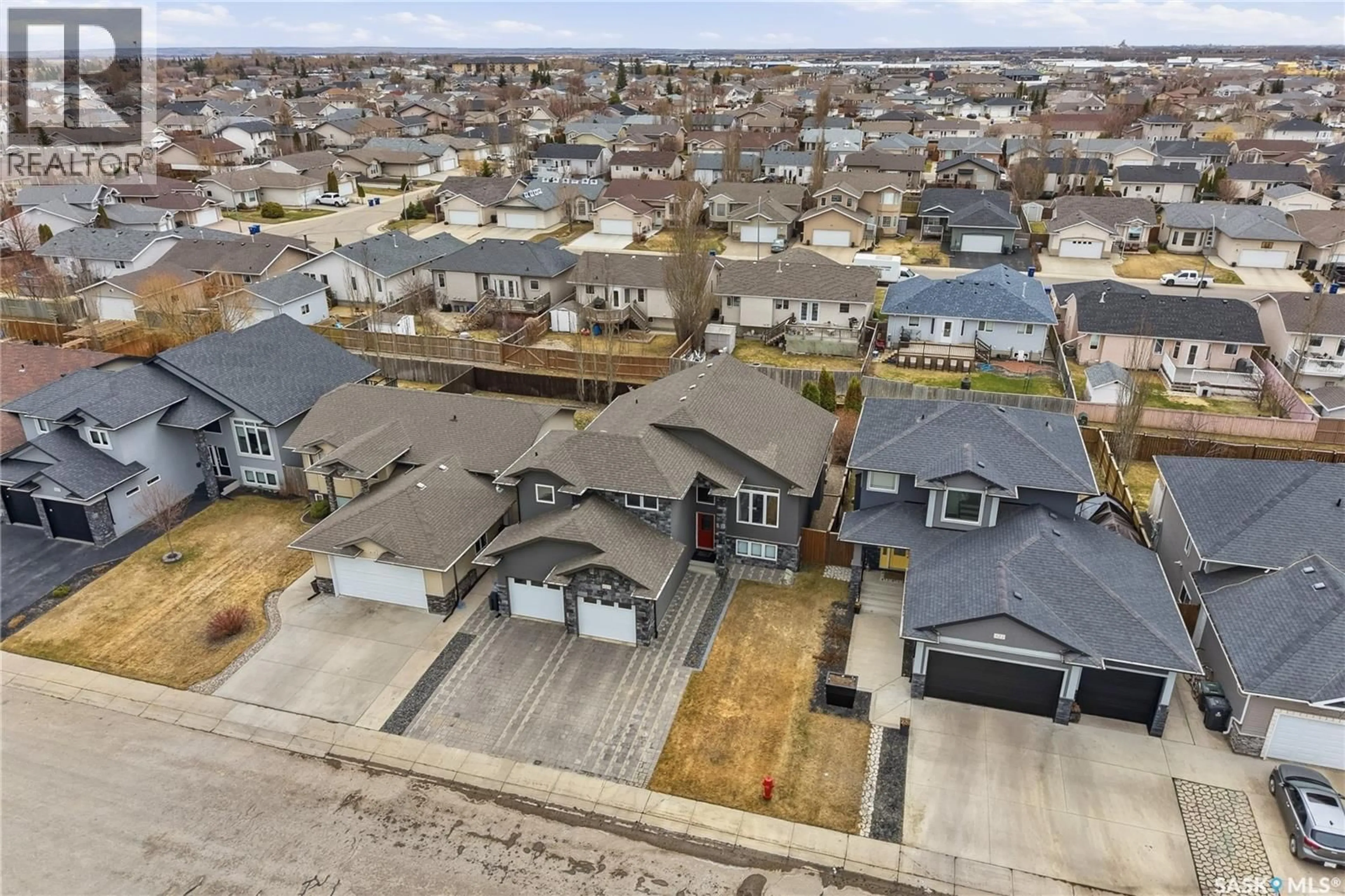 A pic from outside/outdoor area/front of a property/back of a property/a pic from drone, street for 613 REDWOOD CRESCENT, Warman Saskatchewan S0K4S2