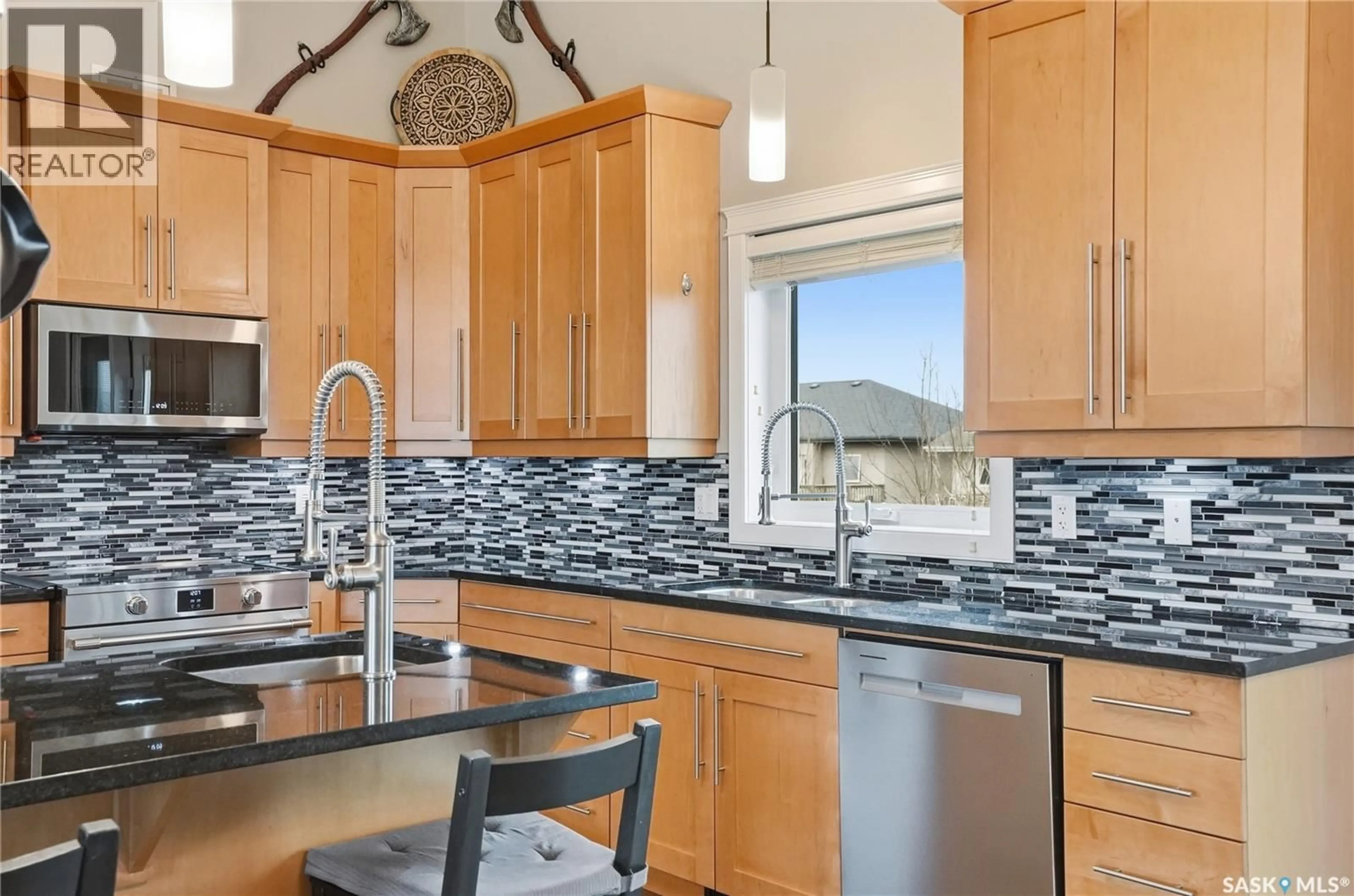 Contemporary kitchen, ceramic/tile floor for 613 REDWOOD CRESCENT, Warman Saskatchewan S0K4S2