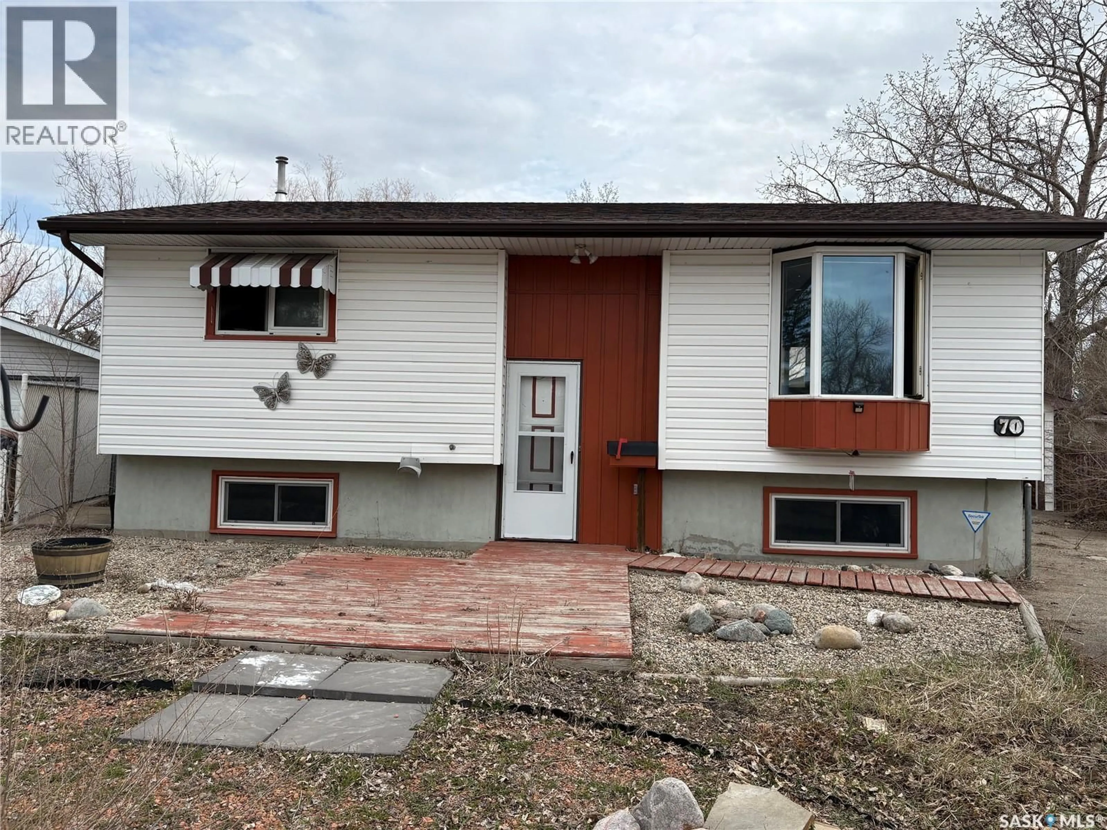 Home with vinyl exterior material, street for 70 STICE CRESCENT, Regina Saskatchewan S4N4P8