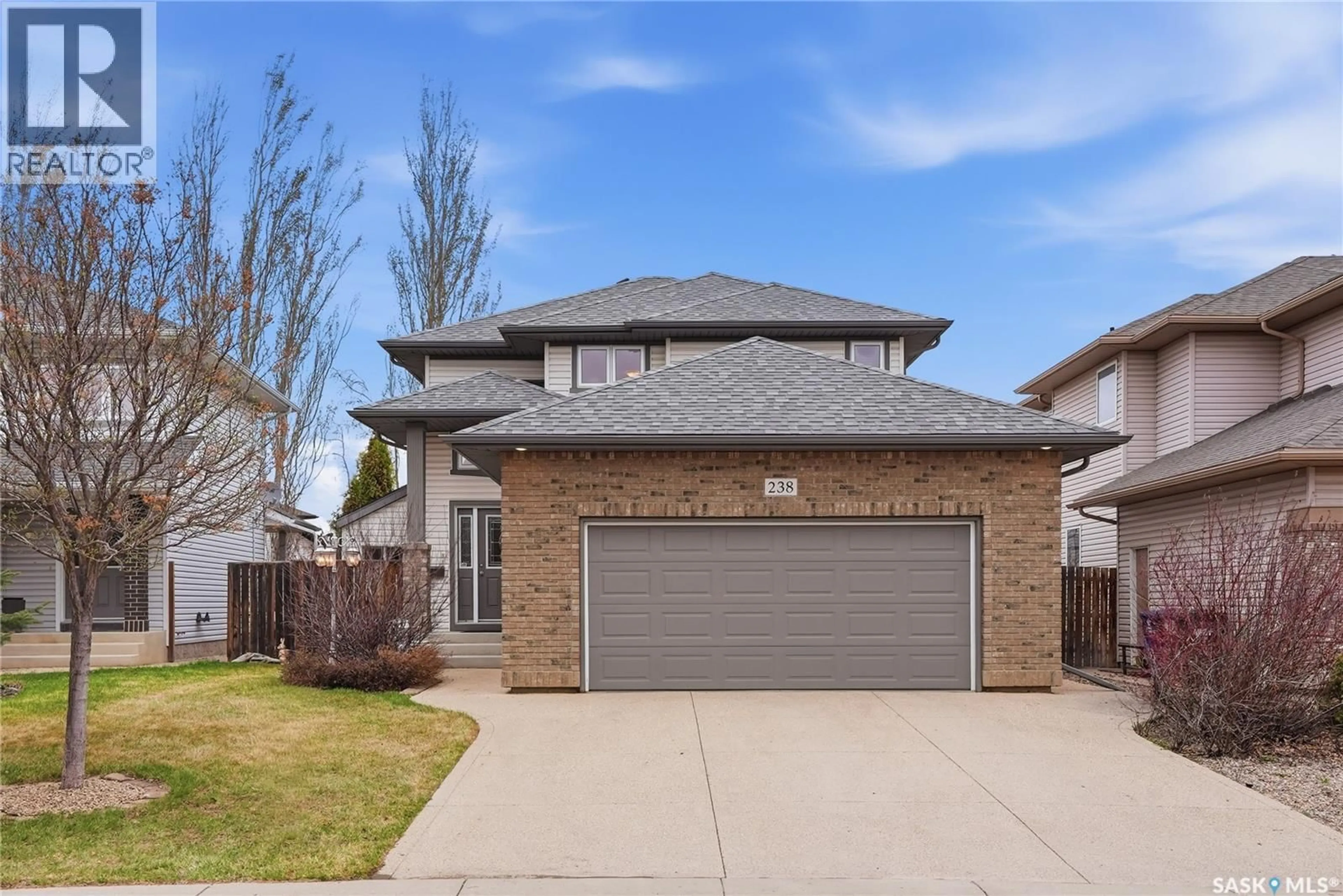 Home with brick exterior material, street for 238 STEPNEY CRESCENT, Saskatoon Saskatchewan S7T0A1