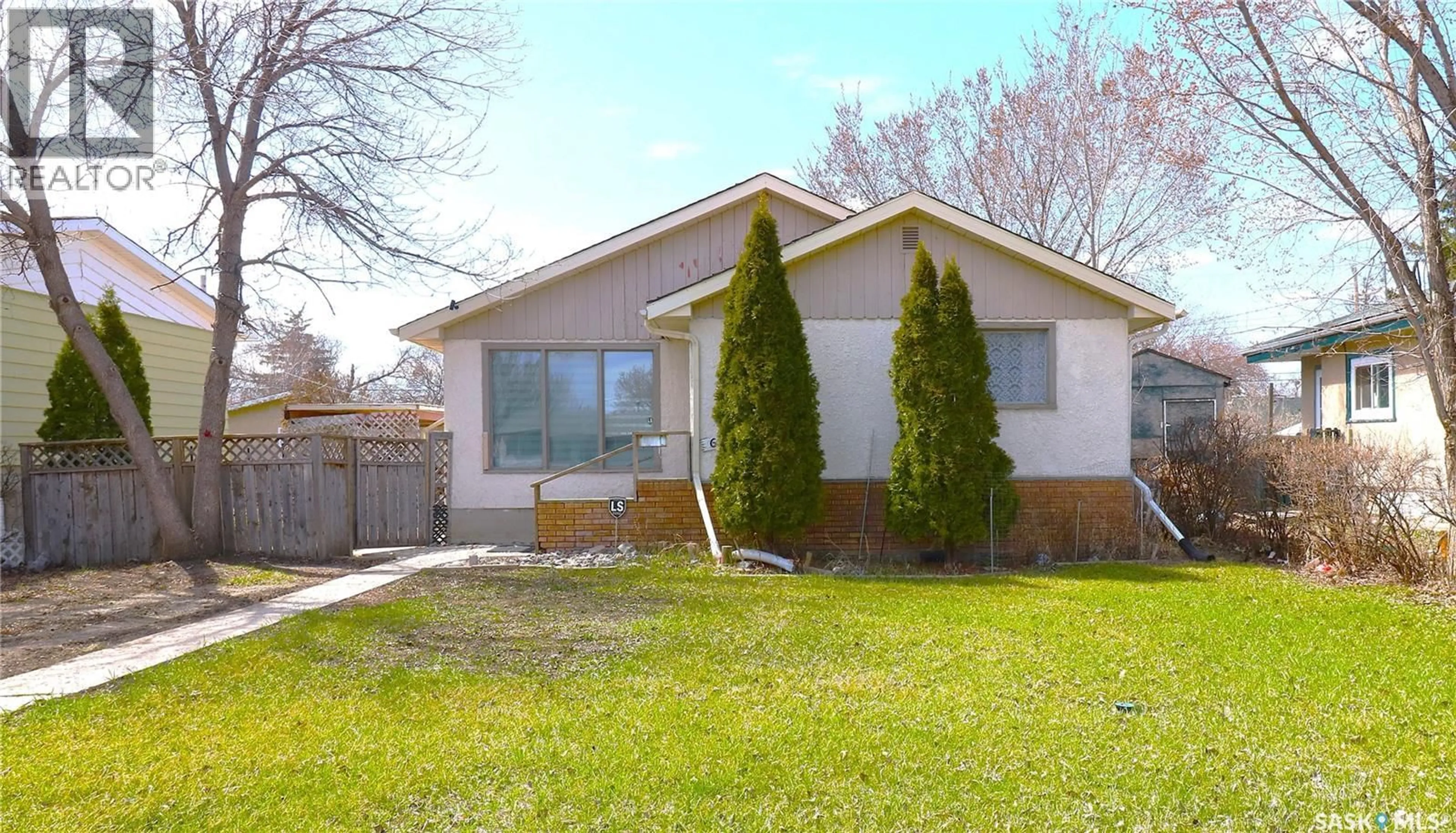 Home with brick exterior material, street for 674 ROBINSON STREET, Regina Saskatchewan S4T2L8