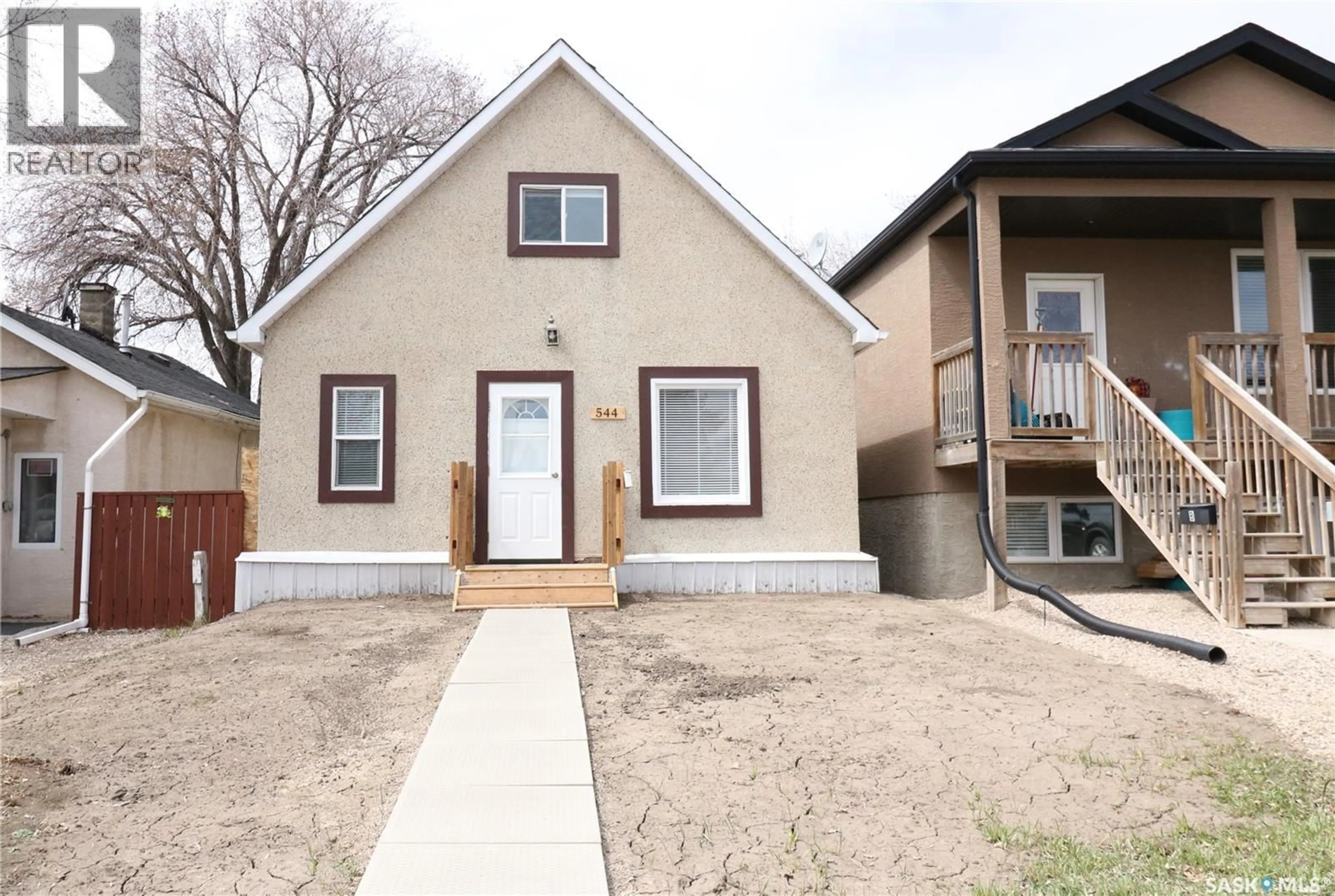 Home with vinyl exterior material, street for 544 OSLER STREET, Regina Saskatchewan S4R1W1