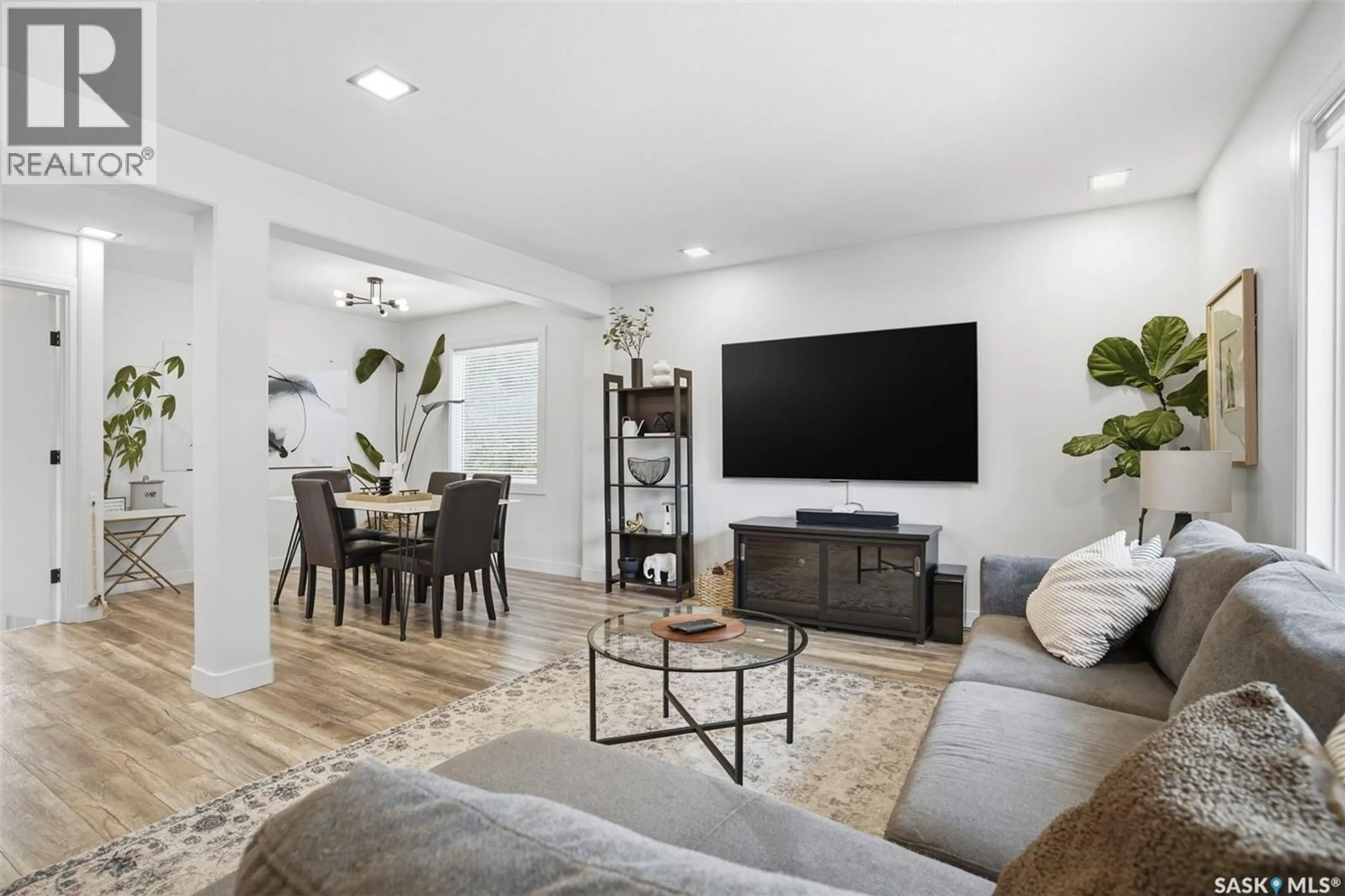 Living room with furniture, unknown for 411 AULD CRESCENT, Saskatoon Saskatchewan S7H4X2