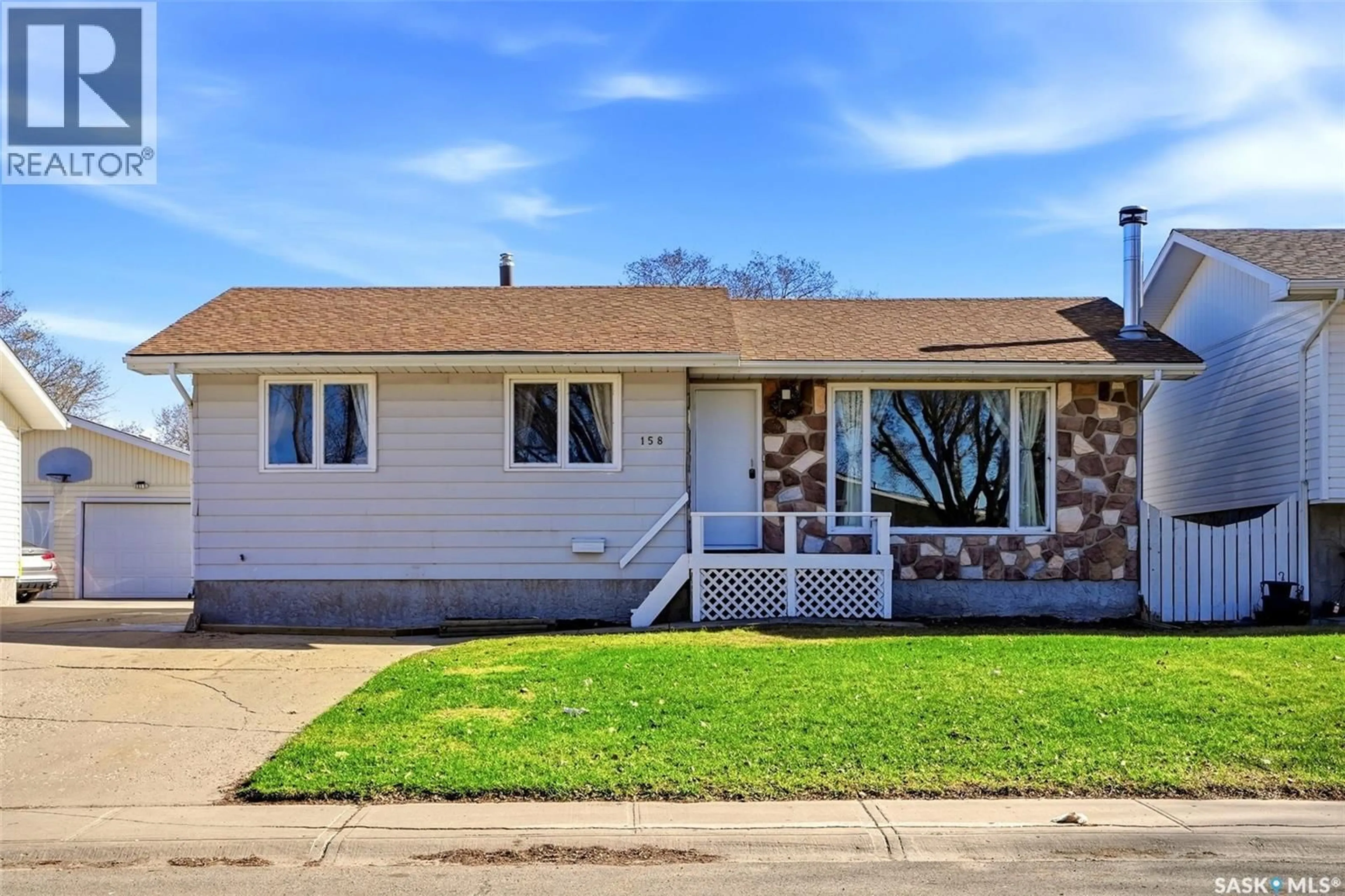 Home with vinyl exterior material, street for 158 TRIFUNOV CRESCENT, Regina Saskatchewan S4R7C9