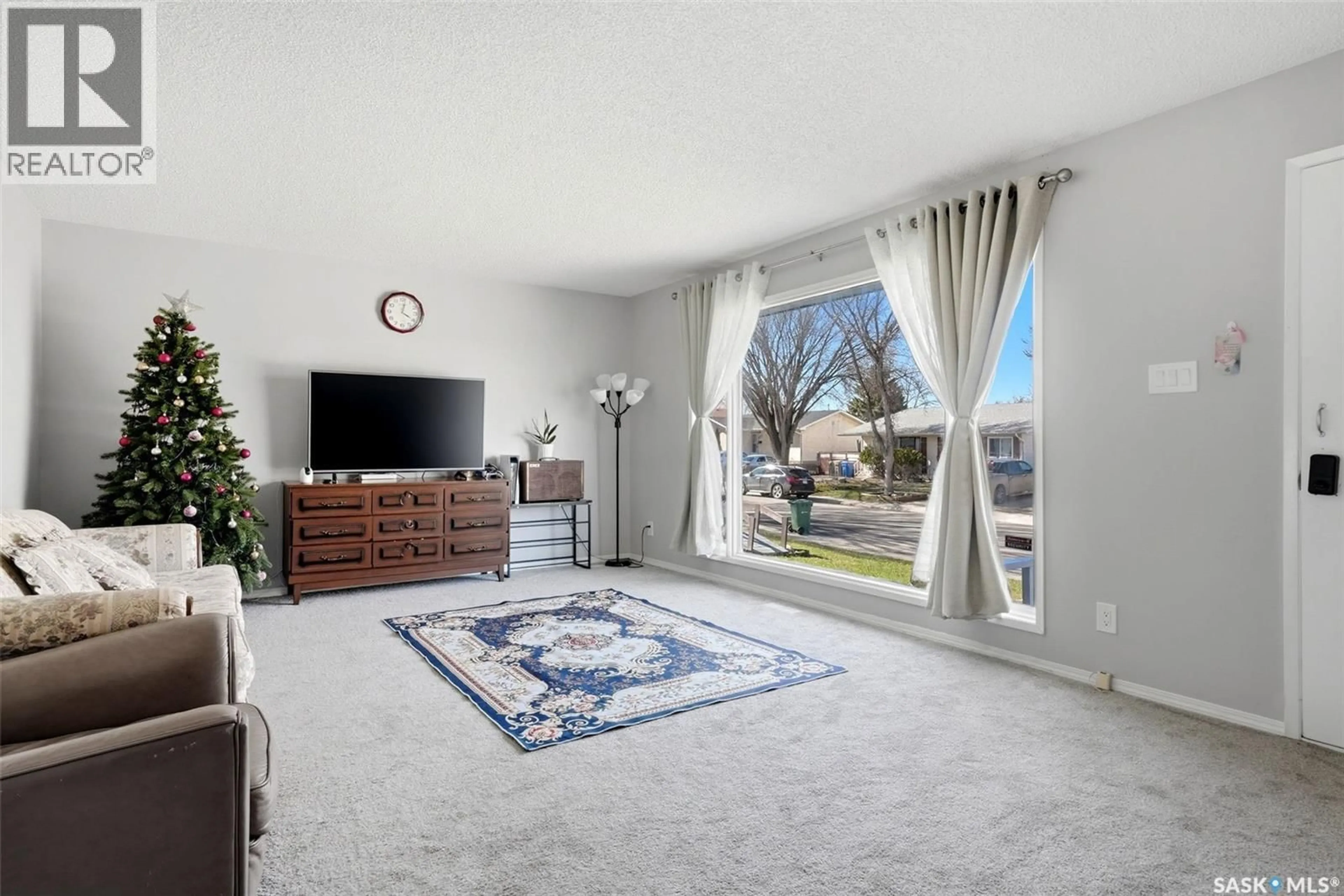 Living room with furniture, unknown for 158 TRIFUNOV CRESCENT, Regina Saskatchewan S4R7C9