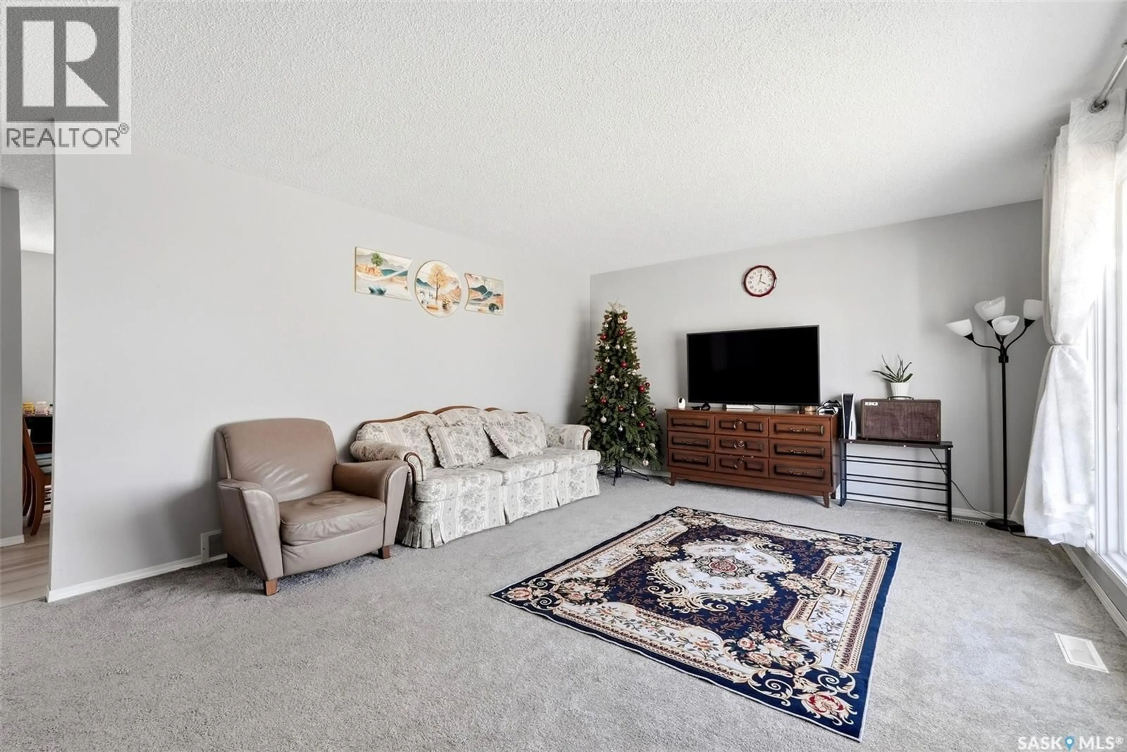 Living room with furniture, unknown for 158 TRIFUNOV CRESCENT, Regina Saskatchewan S4R7C9