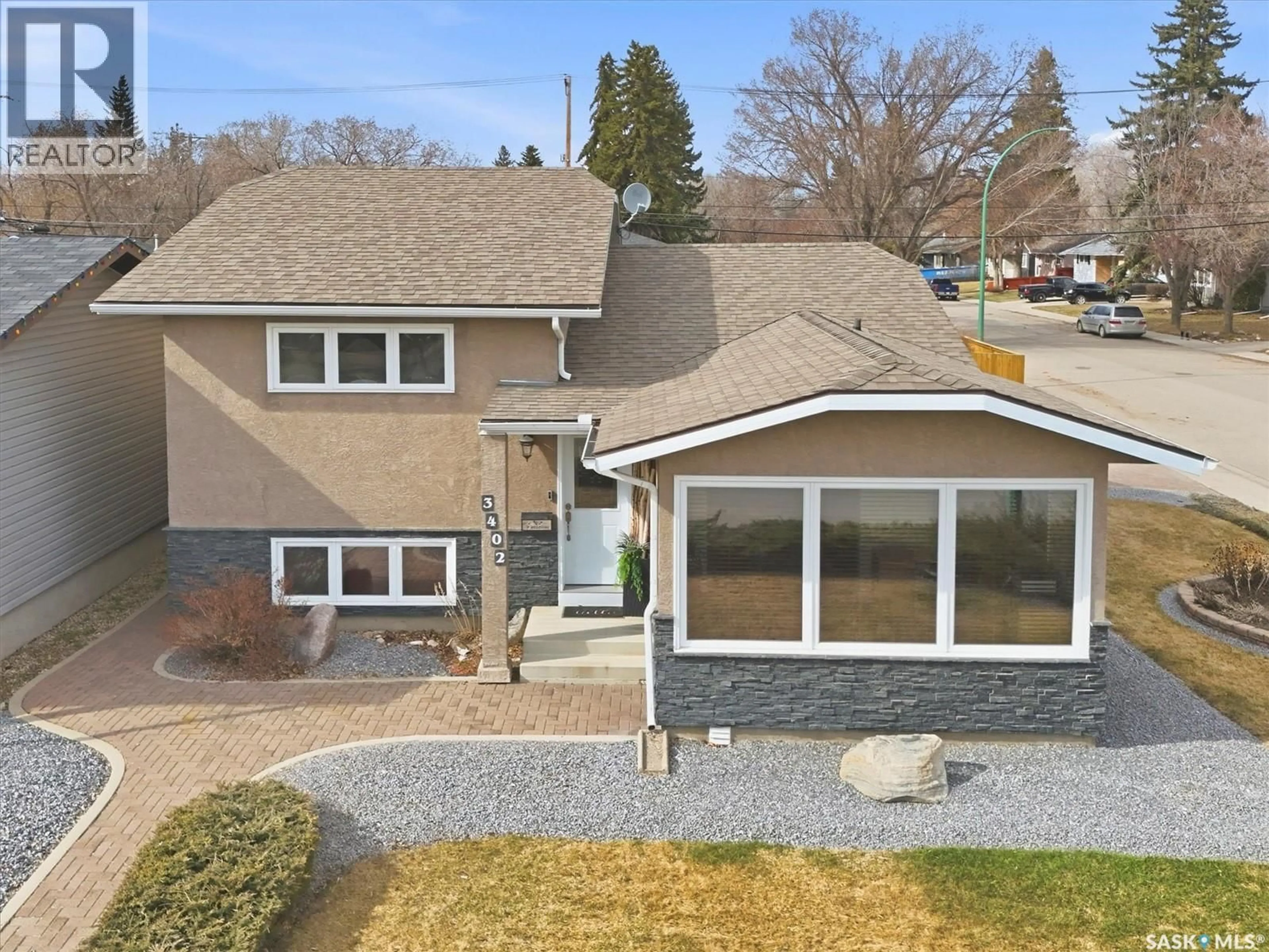 A pic from outside/outdoor area/front of a property/back of a property/a pic from drone, street for 3402 CALDER CRESCENT, Saskatoon Saskatchewan S7J4W6