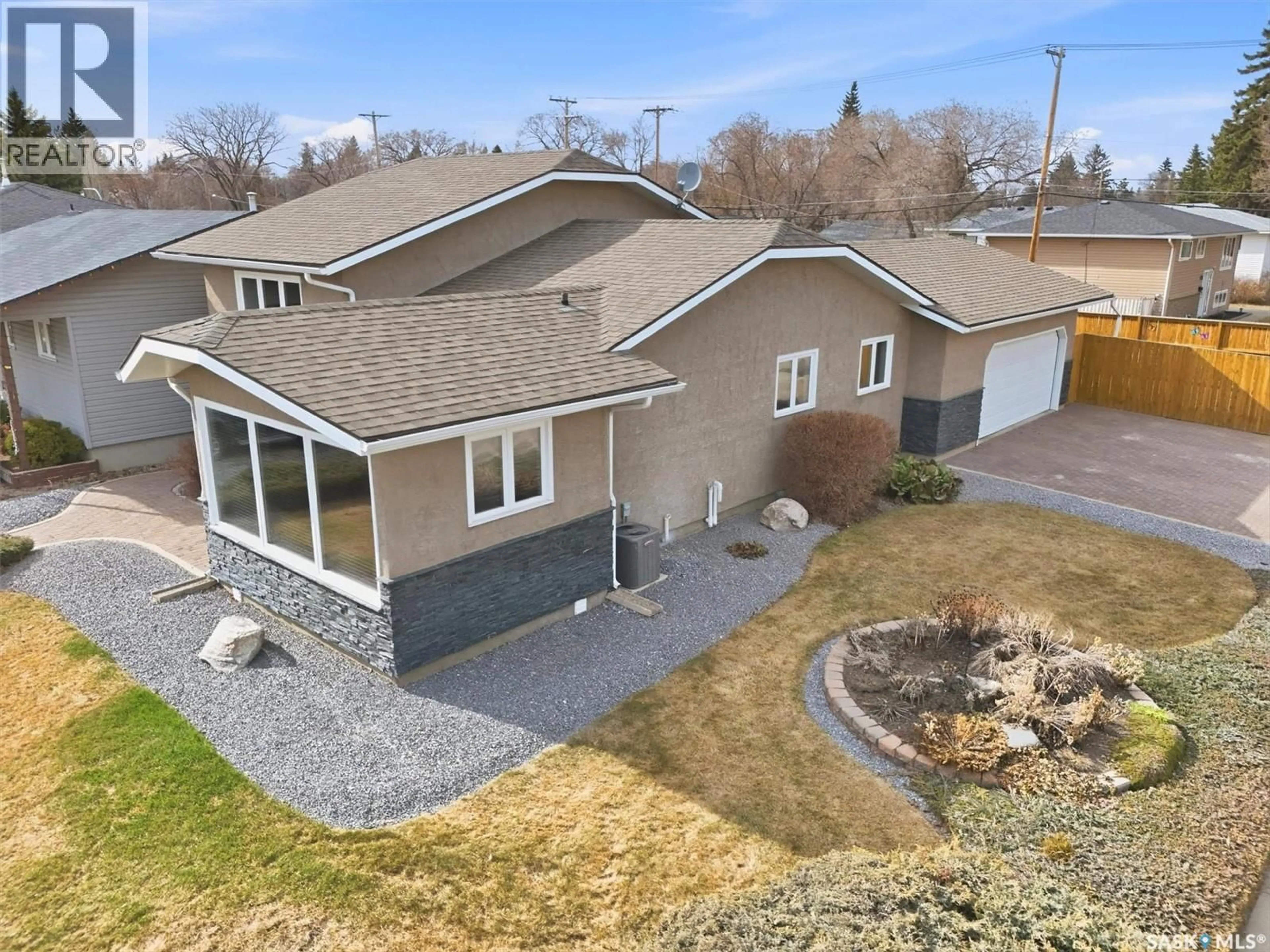 A pic from outside/outdoor area/front of a property/back of a property/a pic from drone, street for 3402 CALDER CRESCENT, Saskatoon Saskatchewan S7J4W6