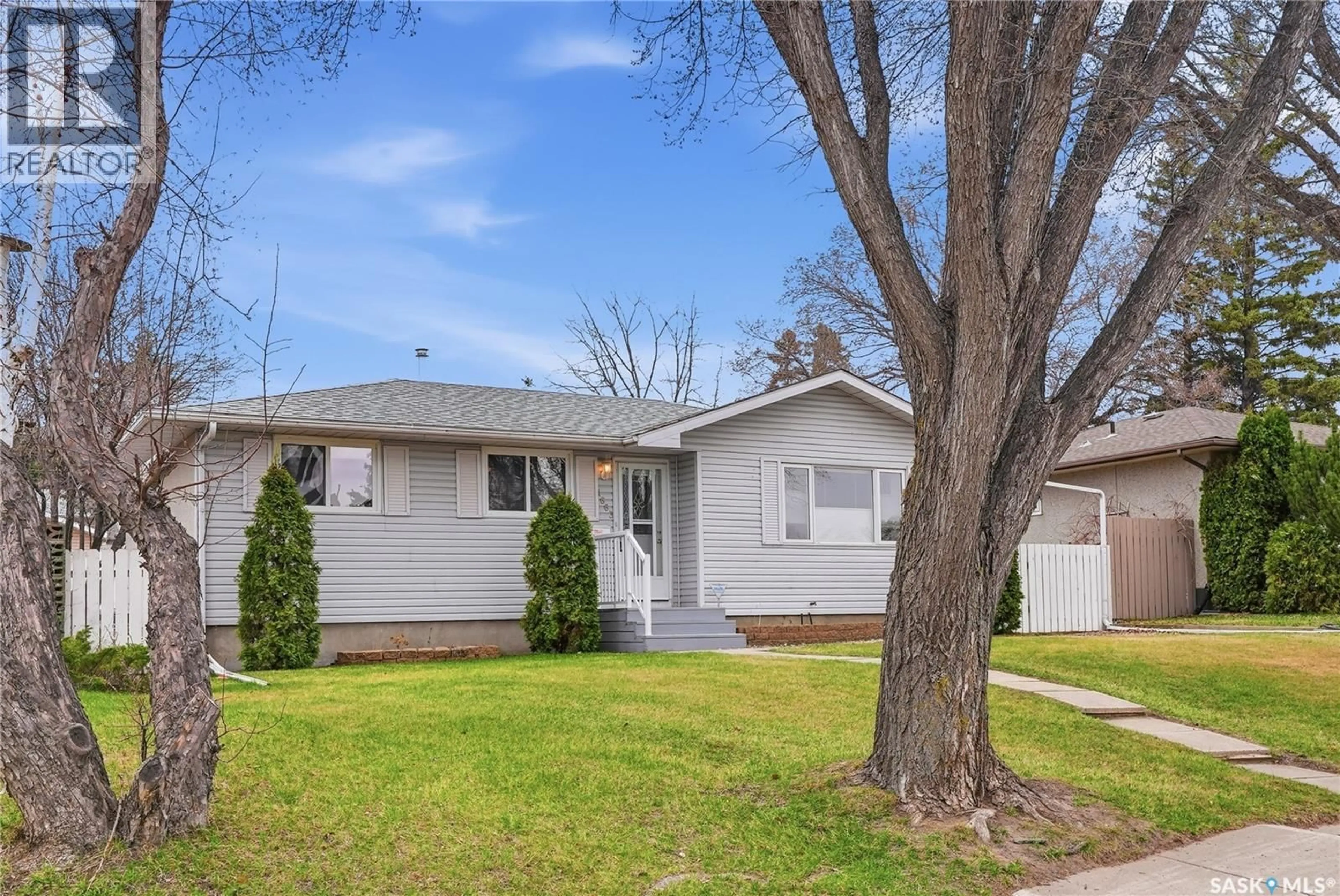 Home with vinyl exterior material, street for 1663 ALEXANDRA AVENUE, Saskatoon Saskatchewan S7K3C4