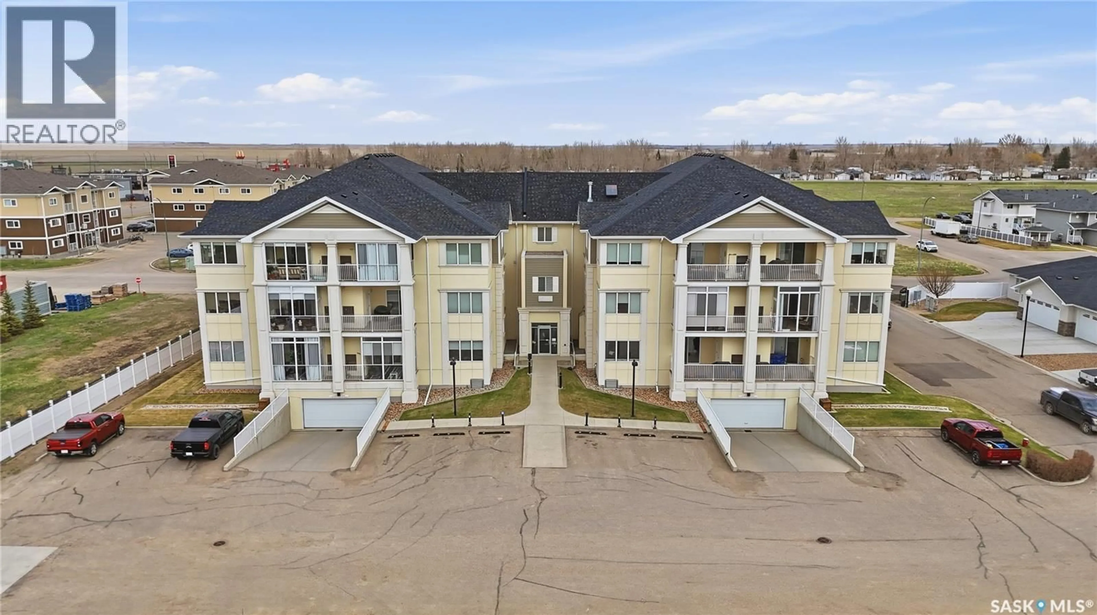 A pic from outside/outdoor area/front of a property/back of a property/a pic from drone, building for 830A - 204 CHESTER ROAD, Moose Jaw Saskatchewan S6J0A6