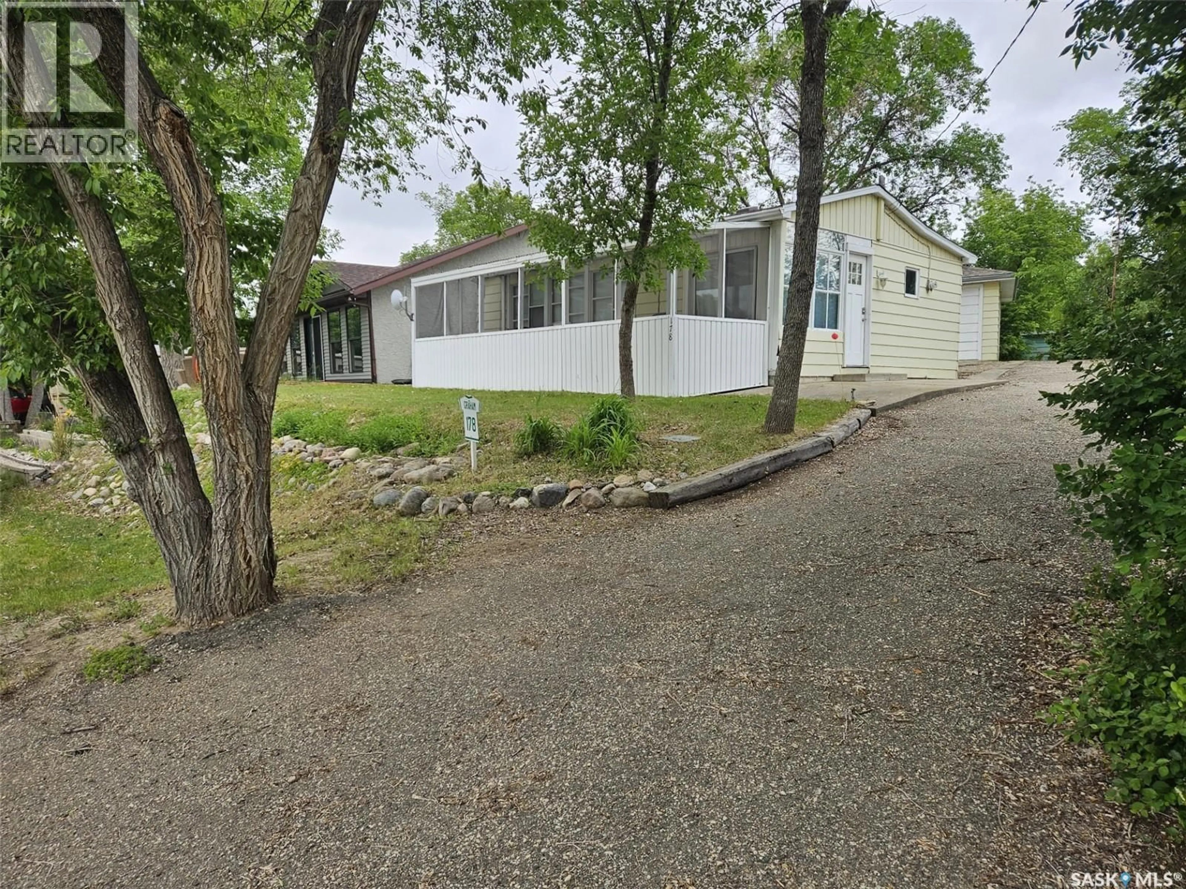 A pic from outside/outdoor area/front of a property/back of a property/a pic from drone, street for 178 LAKESHORE DRIVE, Kannata Valley Saskatchewan S0G4L0