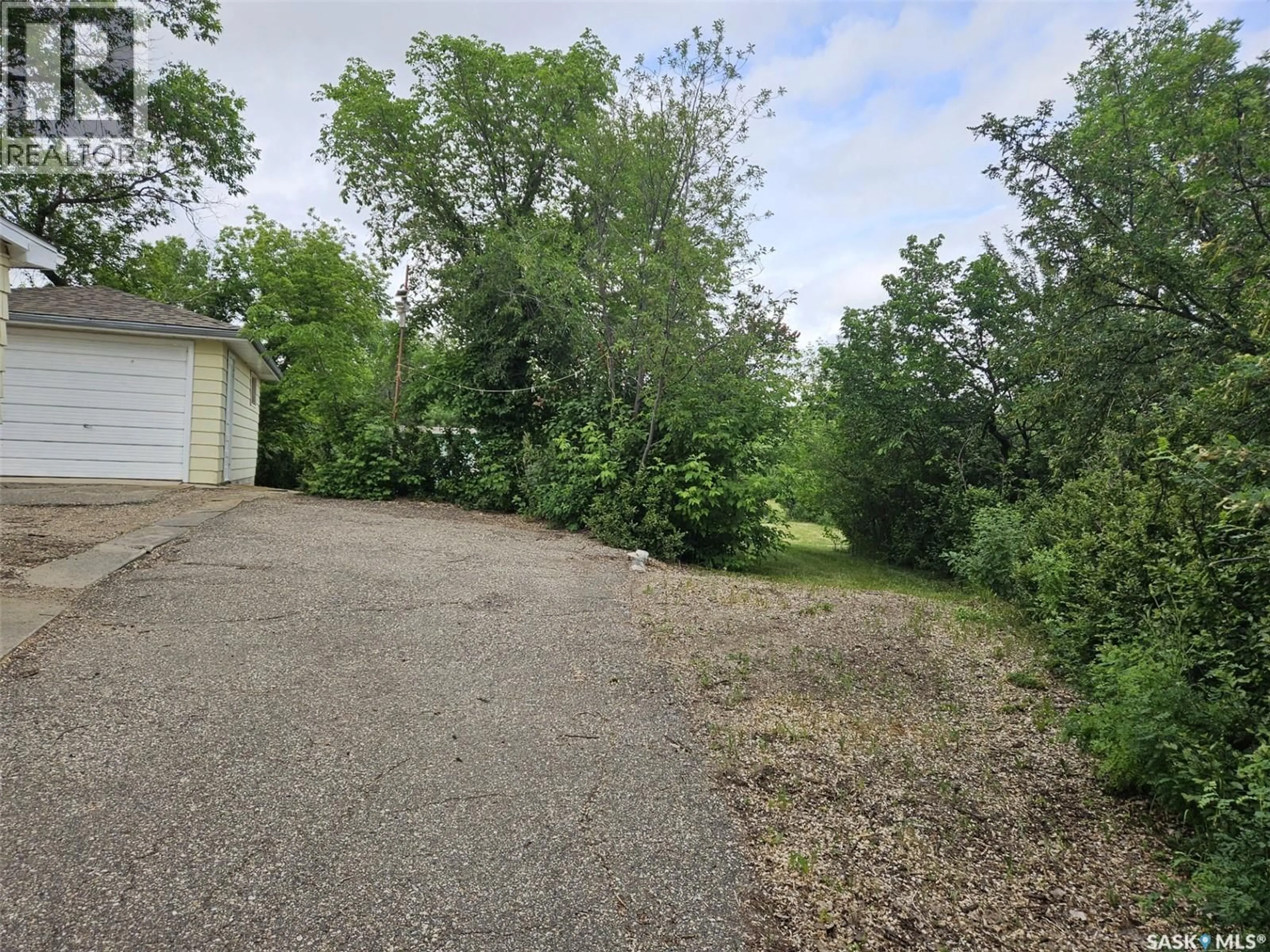A pic from outside/outdoor area/front of a property/back of a property/a pic from drone, forest/trees view for 178 LAKESHORE DRIVE, Kannata Valley Saskatchewan S0G4L0
