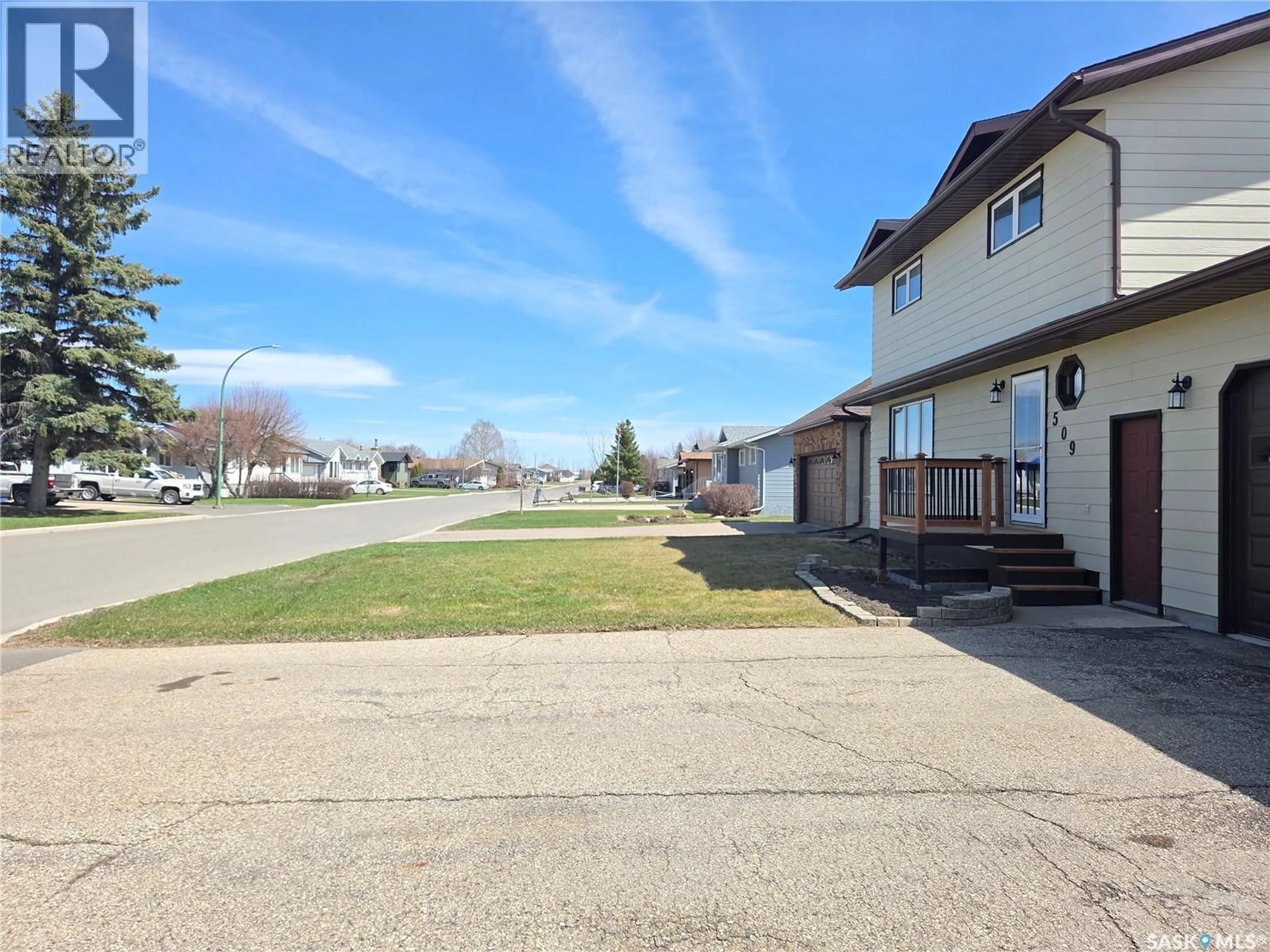 A pic from outside/outdoor area/front of a property/back of a property/a pic from drone, street for 509 CARLYLE AVENUE, Carlyle Saskatchewan S0C0R0