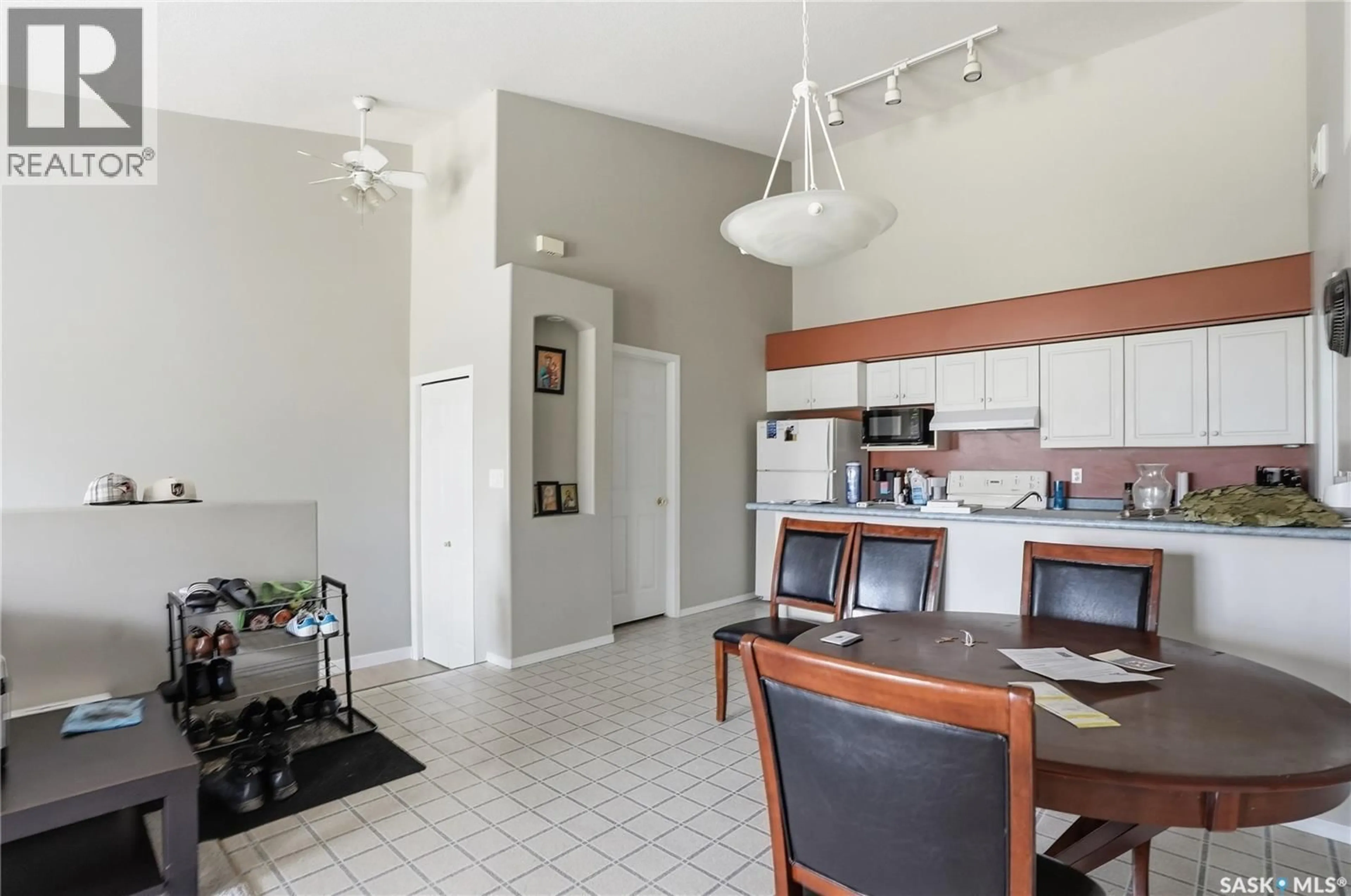 Open concept kitchen, ceramic/tile floor for 105th - 203F 141 STREET, Saskatoon Saskatchewan S7N1N3