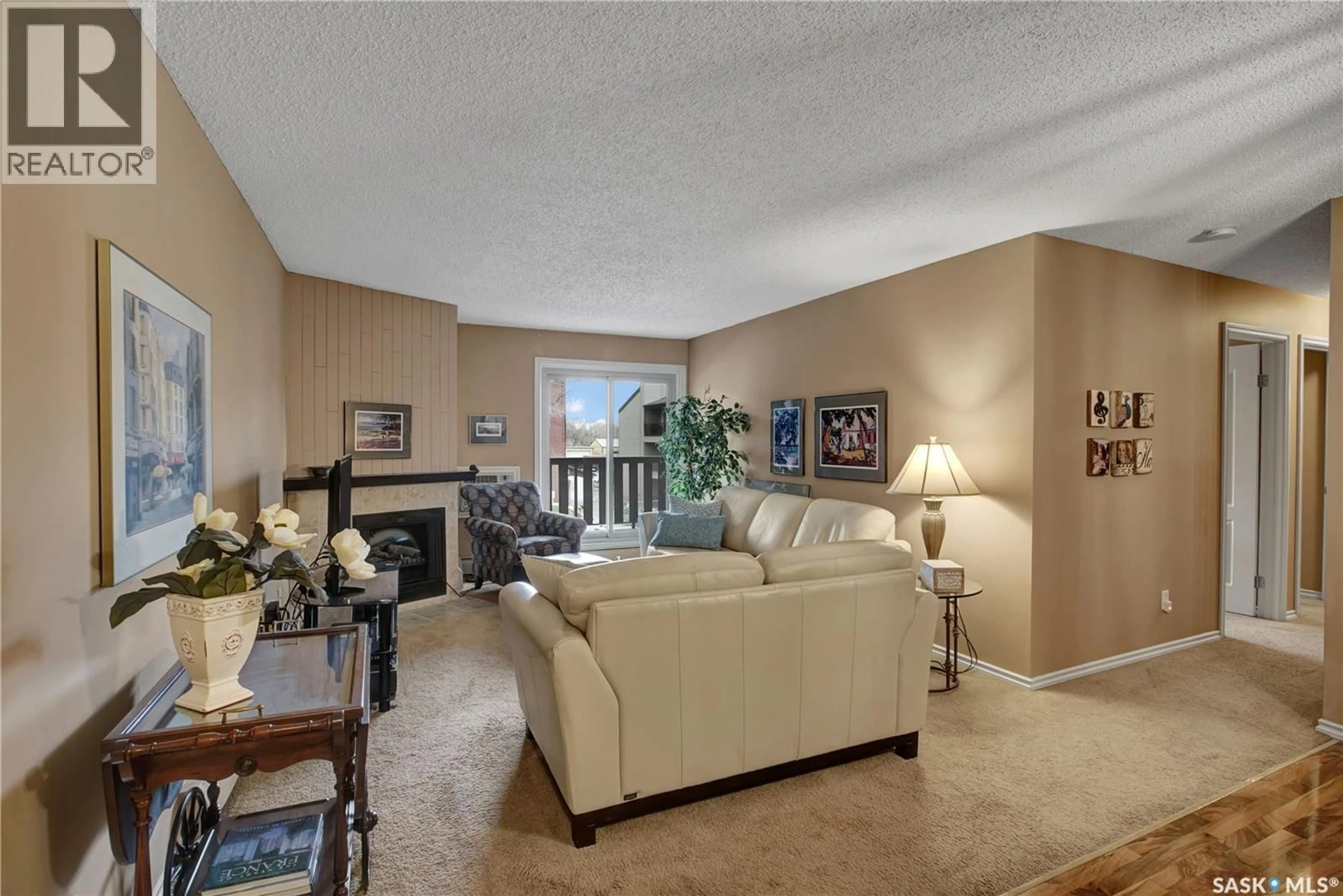 Living room with furniture, unknown for 202D1 - 1121 MCKERCHER DRIVE, Saskatoon Saskatchewan S7H5B8
