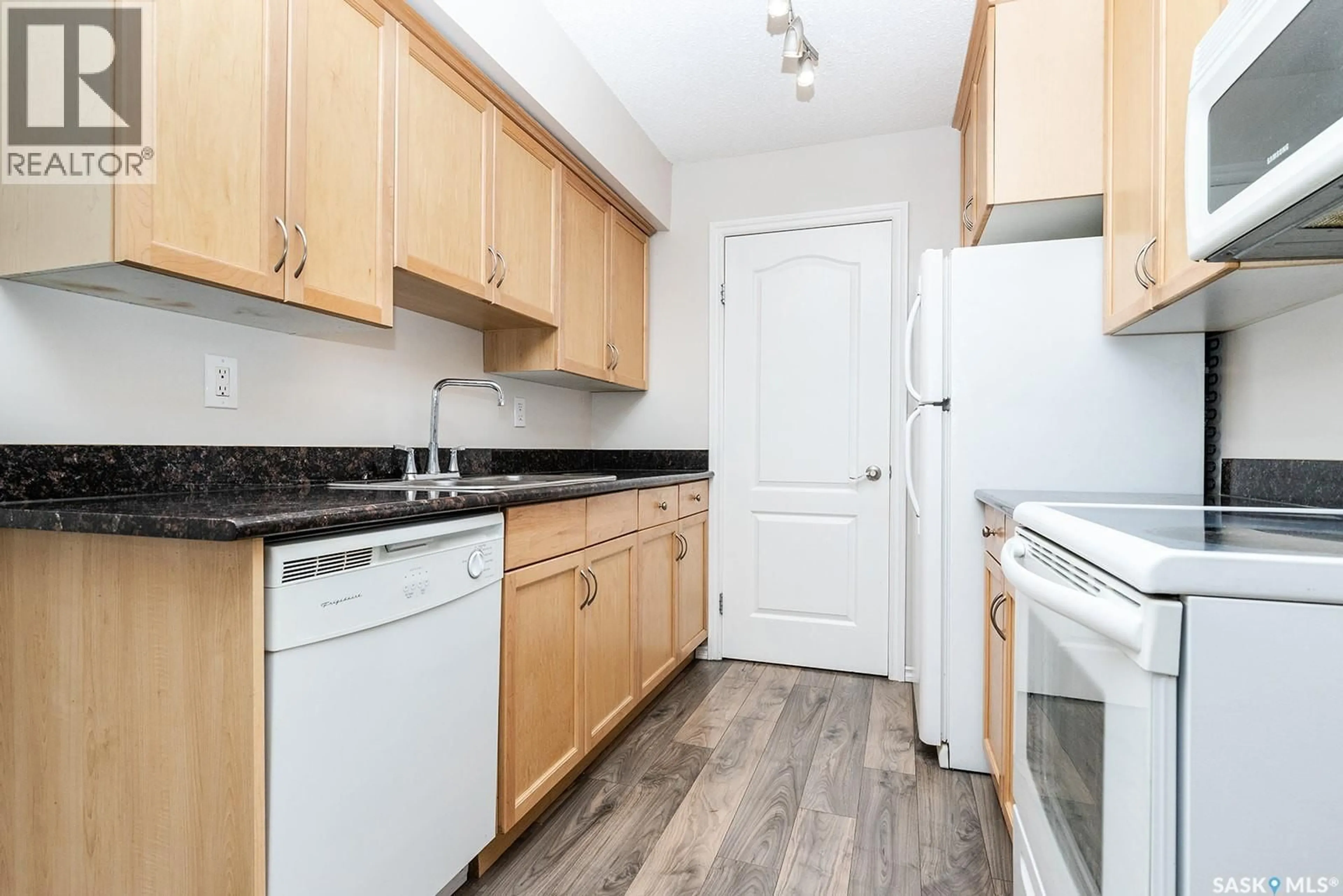 Standard kitchen, wood/laminate floor for 102D2 - 1121 MCKERCHER DRIVE, Saskatoon Saskatchewan S7H5B8