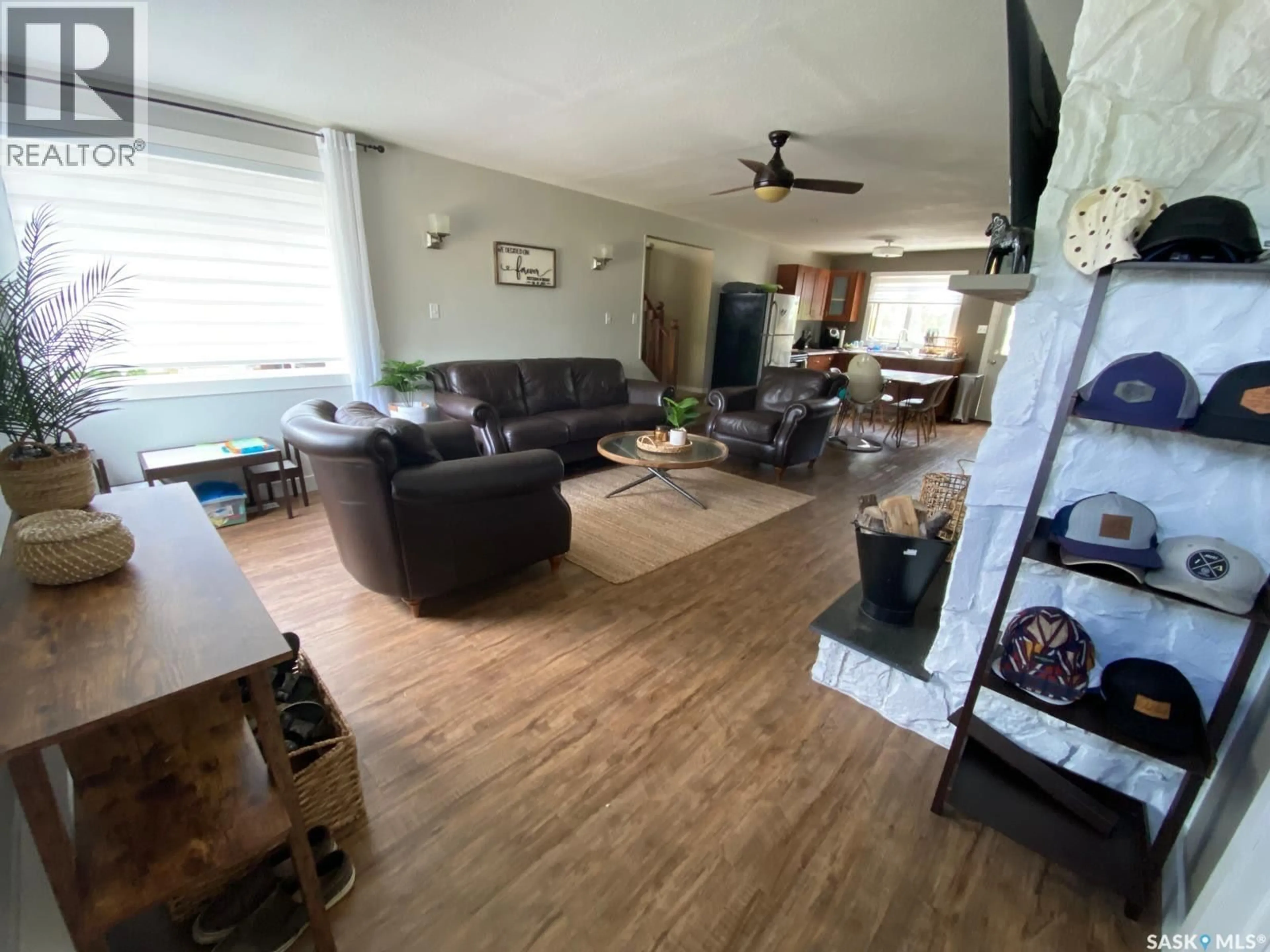 Living room with furniture, wood/laminate floor for 610 AURORA STREET, Saskatchewan Beach Saskatchewan S0G4L0