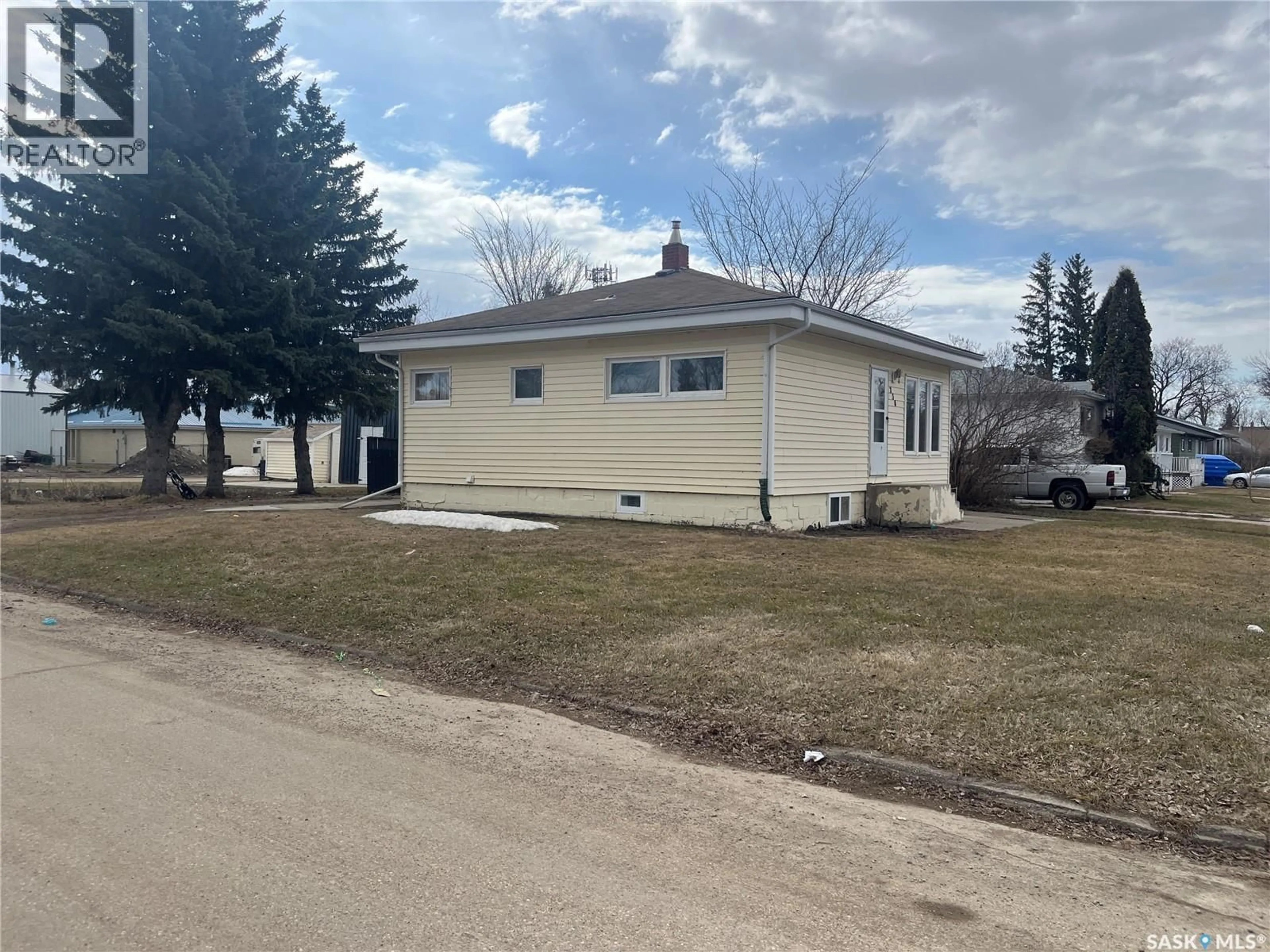 A pic from outside/outdoor area/front of a property/back of a property/a pic from drone, street for 238 1ST STREET, Wadena Saskatchewan S0A4J0