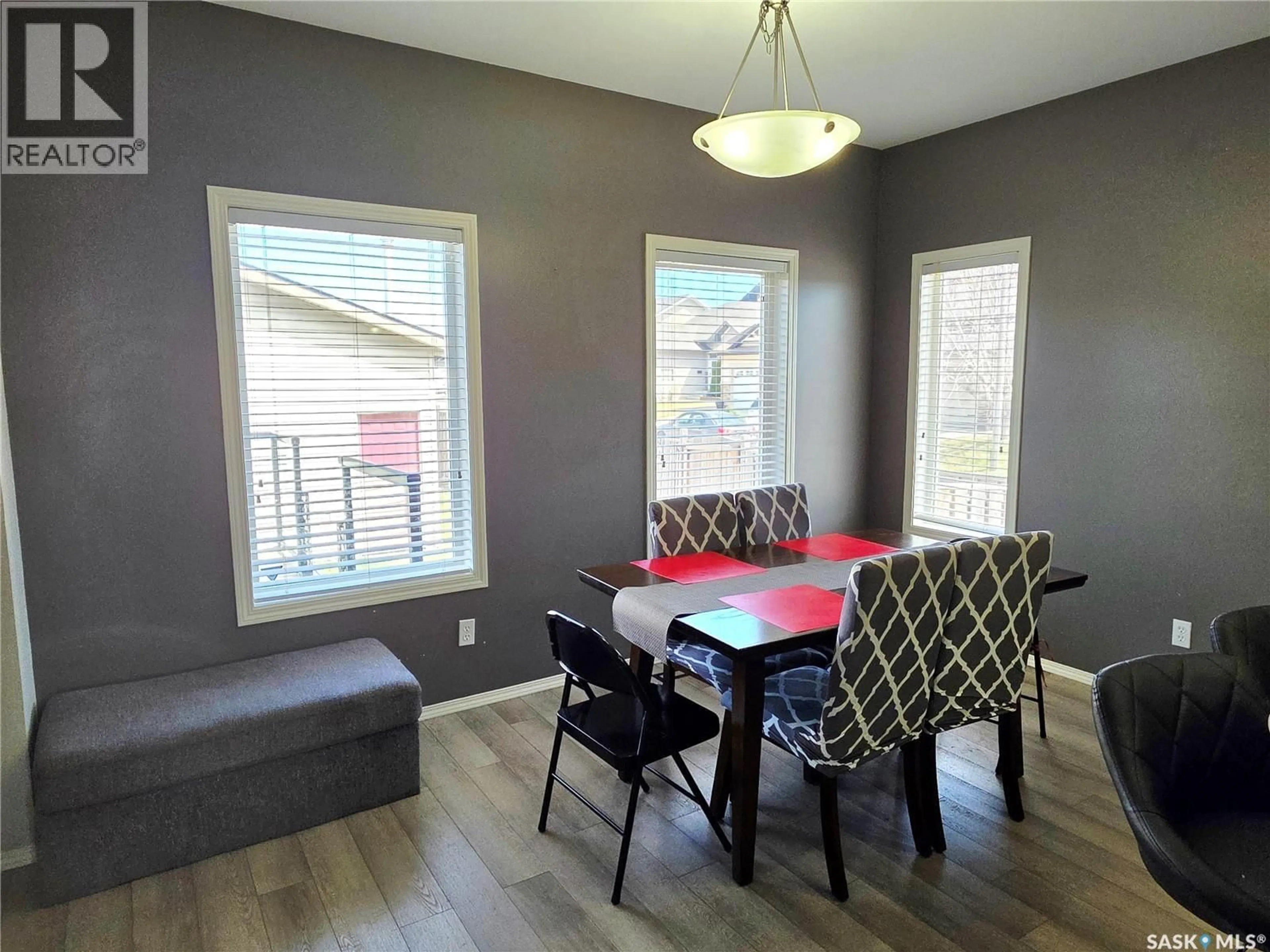 Dining room, wood/laminate floor for 531 GORDON ROAD, Saskatoon Saskatchewan S7T0A7