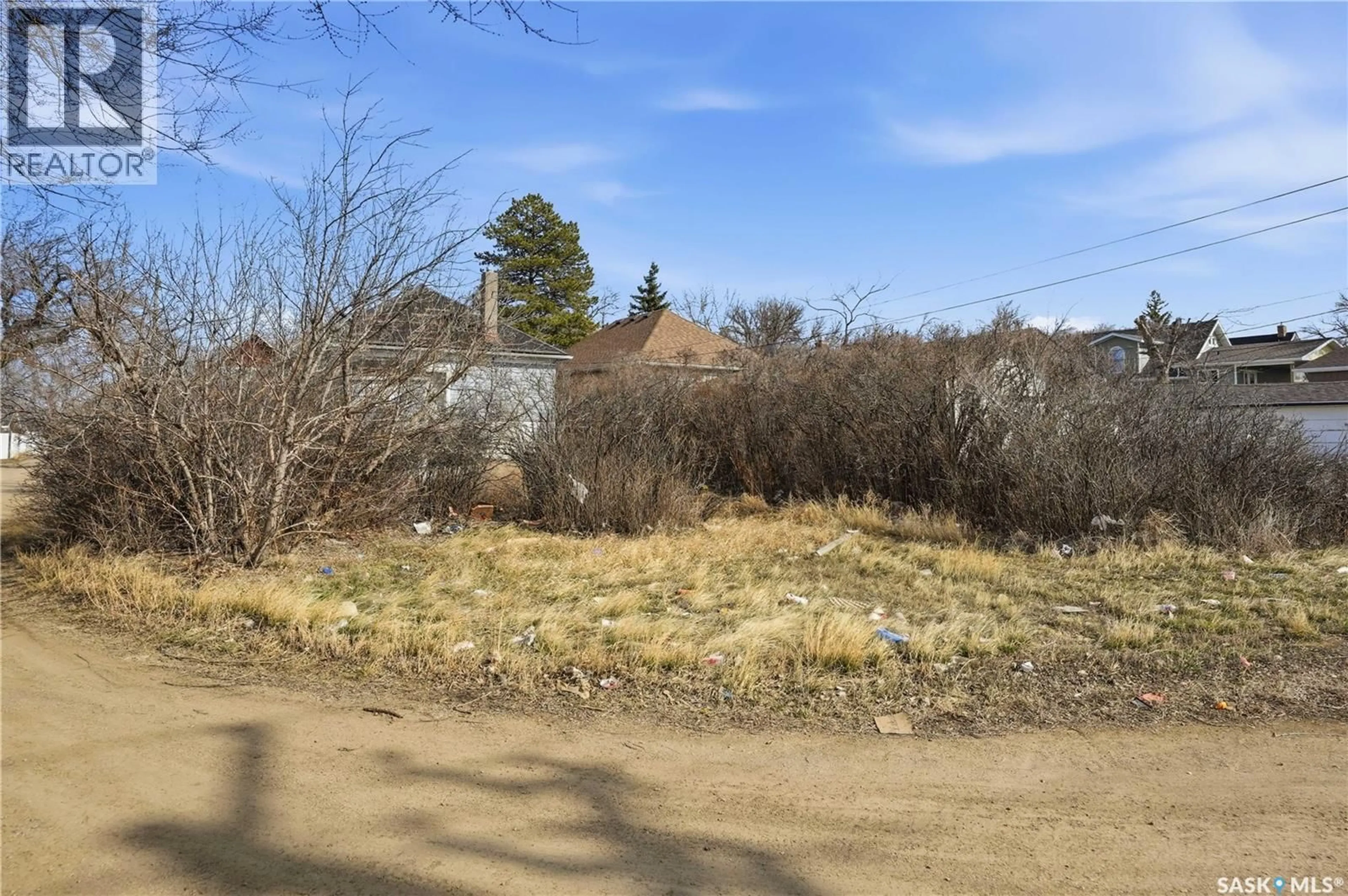 A pic from outside/outdoor area/front of a property/back of a property/a pic from drone, street for 1284 3RD AVENUE, Moose Jaw Saskatchewan S6H1G3