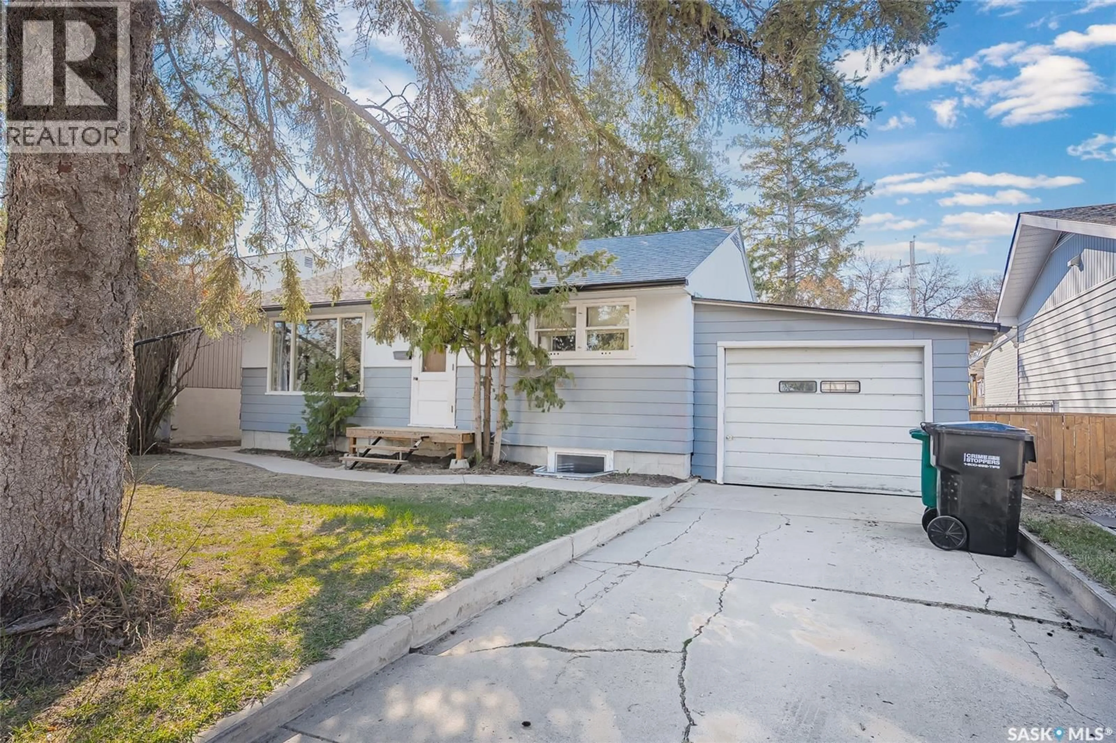 Home with vinyl exterior material, street for 107 CRUISE STREET, Saskatoon Saskatchewan S7N2C2