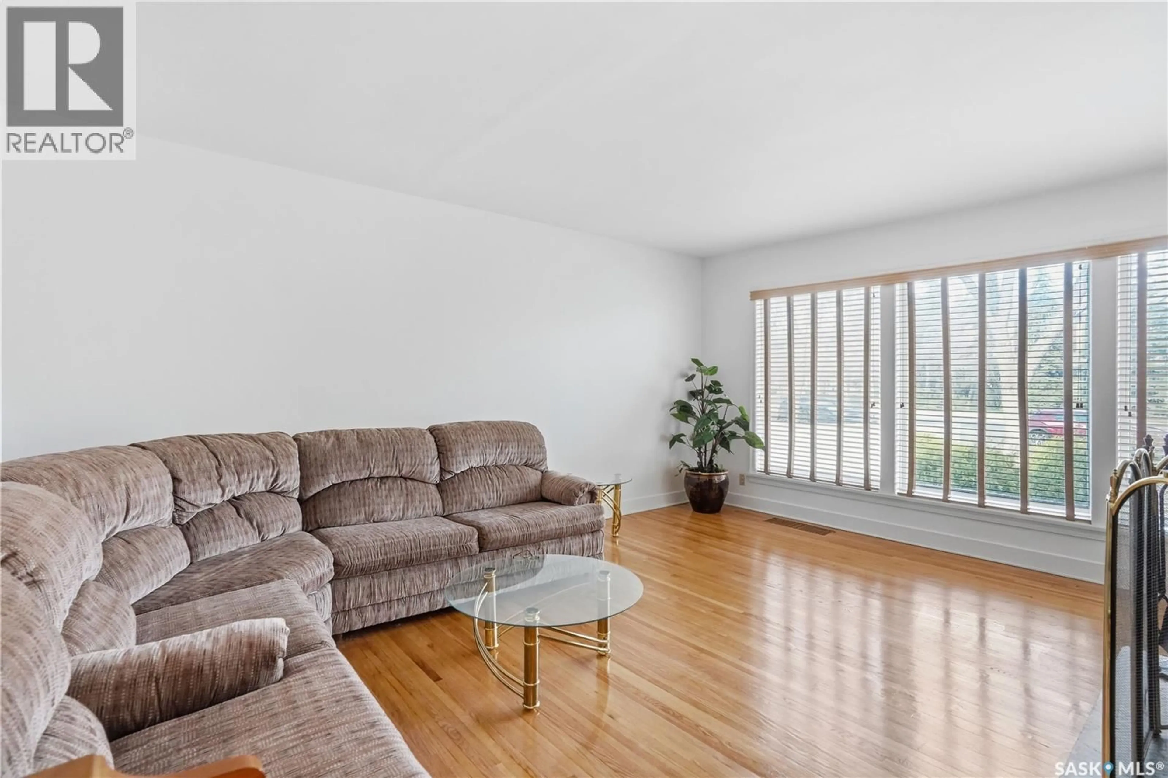Living room with furniture, wood/laminate floor for 3708 ALBERT STREET, Regina Saskatchewan S4S3P9