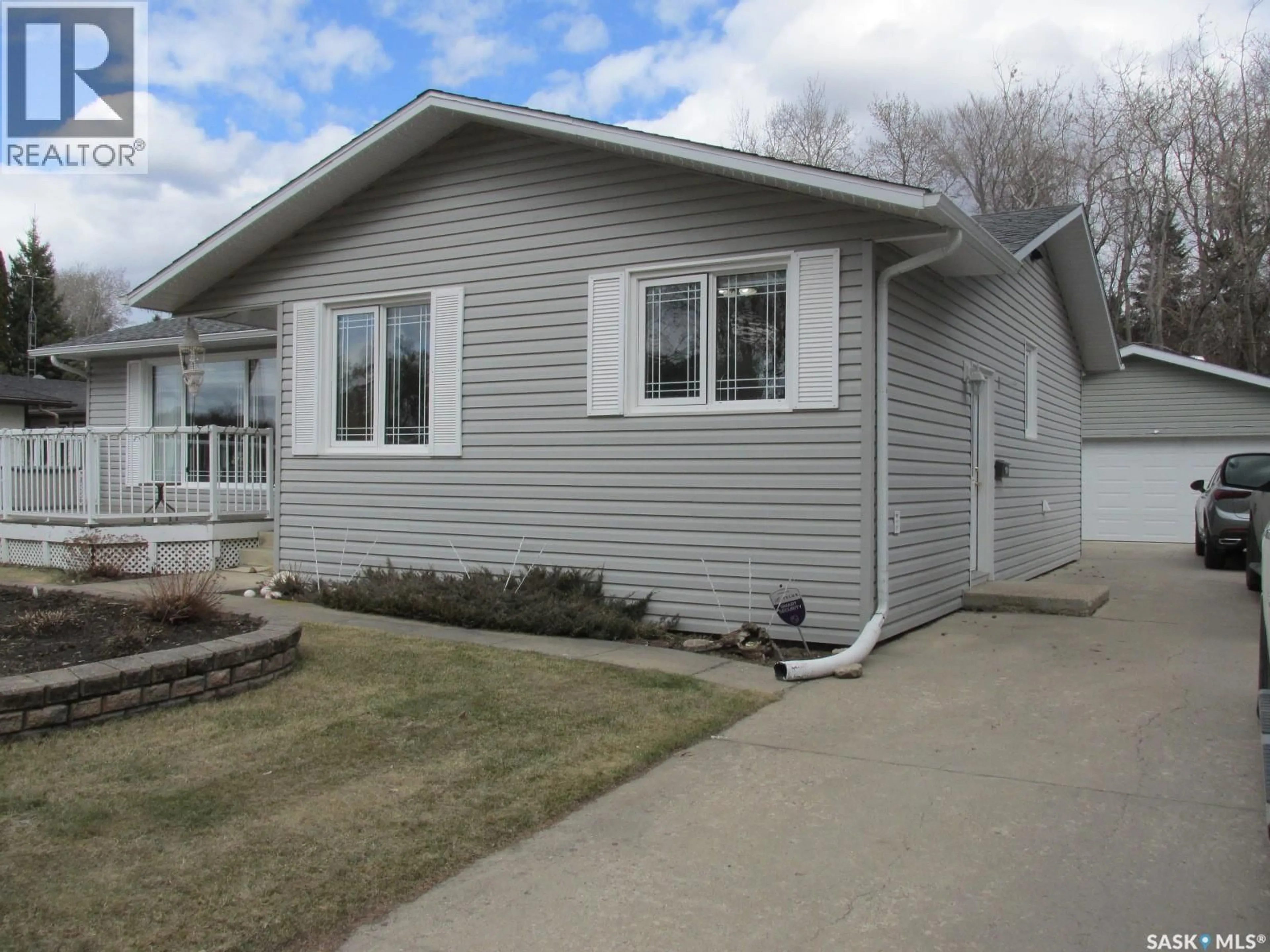 Home with vinyl exterior material, street for 501 4TH STREET, Nipawin Saskatchewan S0E1E0