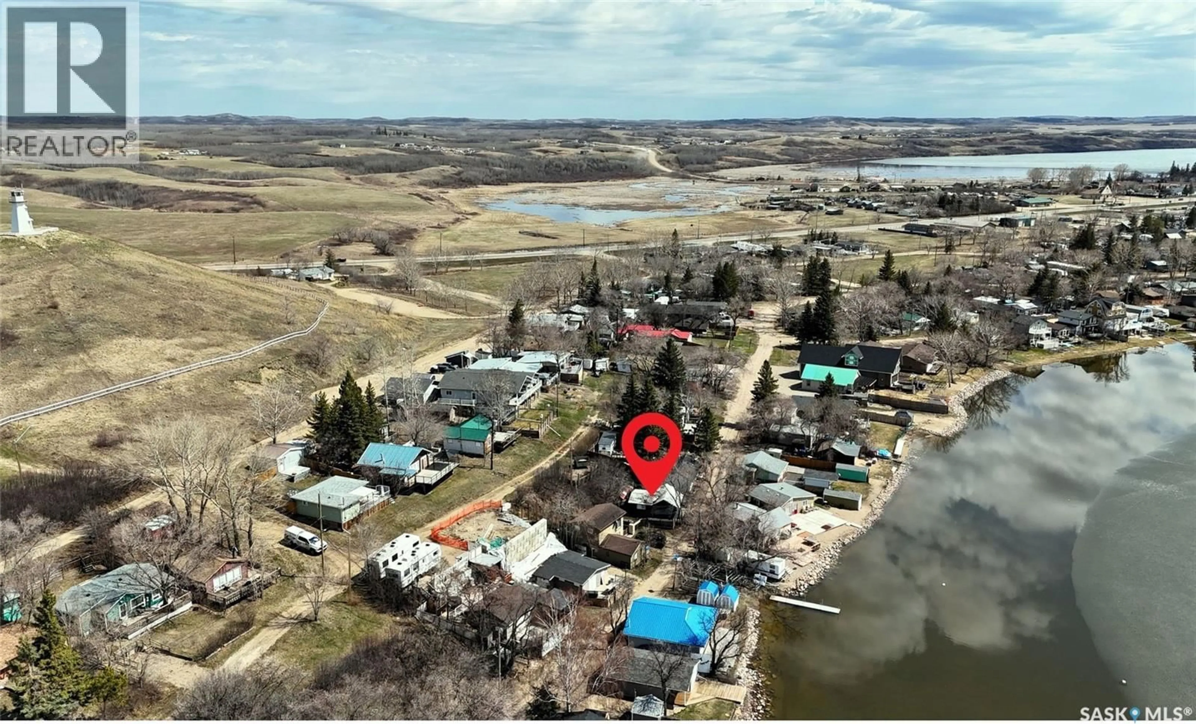 A pic from outside/outdoor area/front of a property/back of a property/a pic from drone, water/lake/river/ocean view for 551 JOSEPH CRESCENT, Cochin Saskatchewan S0M0L0