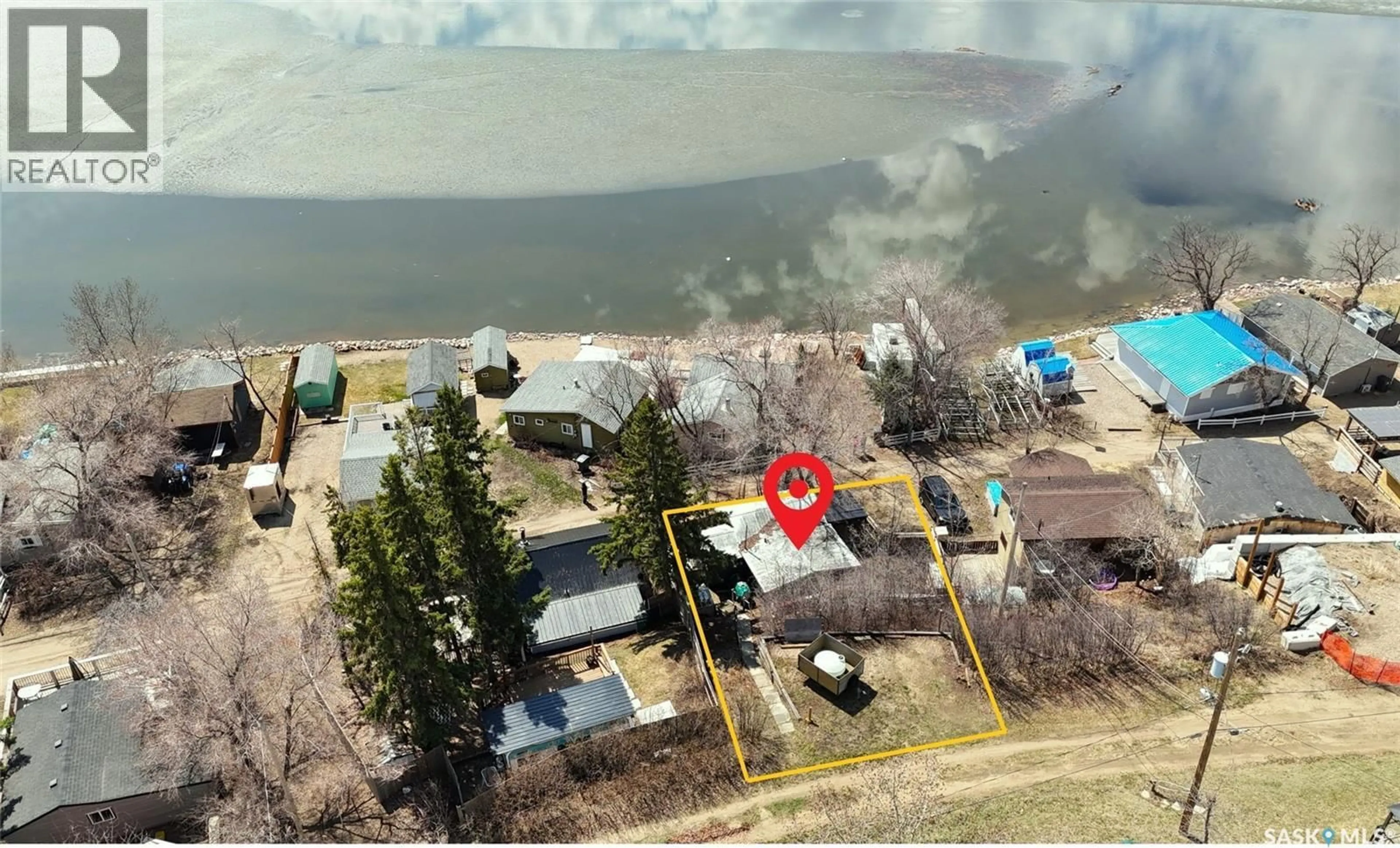 A pic from outside/outdoor area/front of a property/back of a property/a pic from drone, water/lake/river/ocean view for 551 JOSEPH CRESCENT, Cochin Saskatchewan S0M0L0