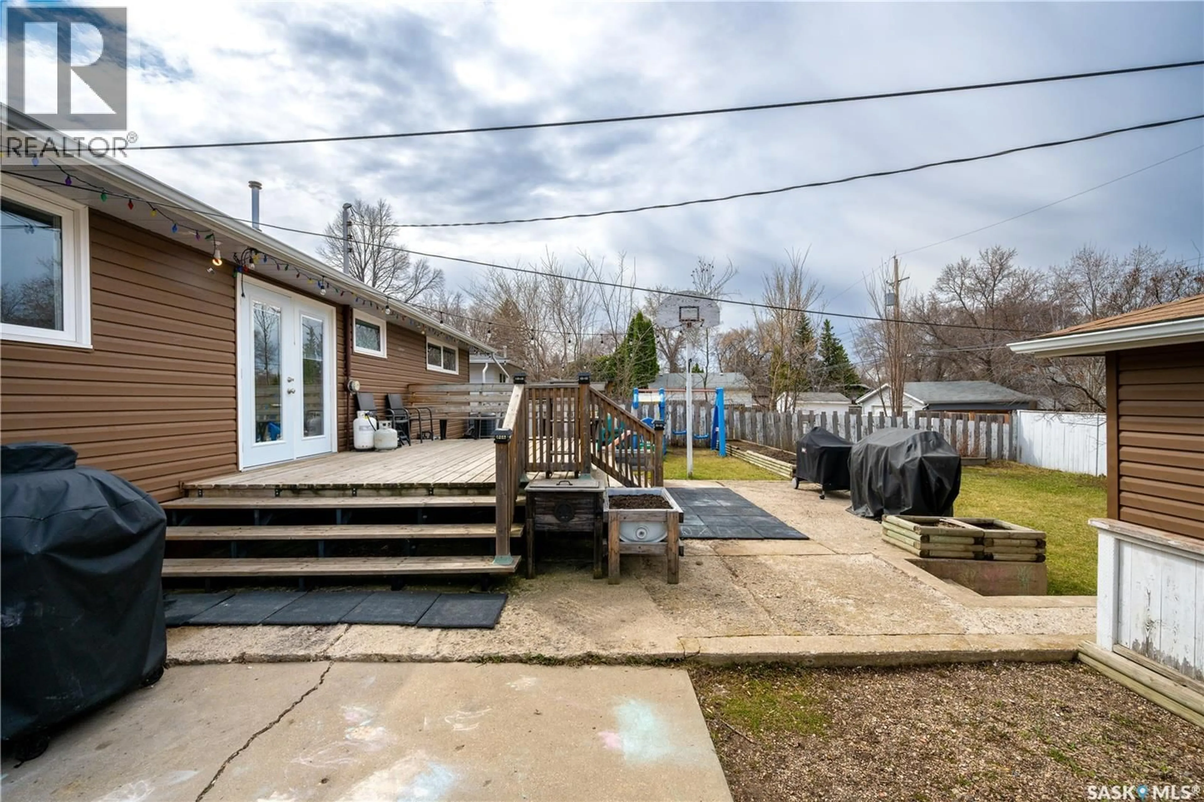 Patio, street for 2406 IRVINE AVENUE, Saskatoon Saskatchewan S7J2A8