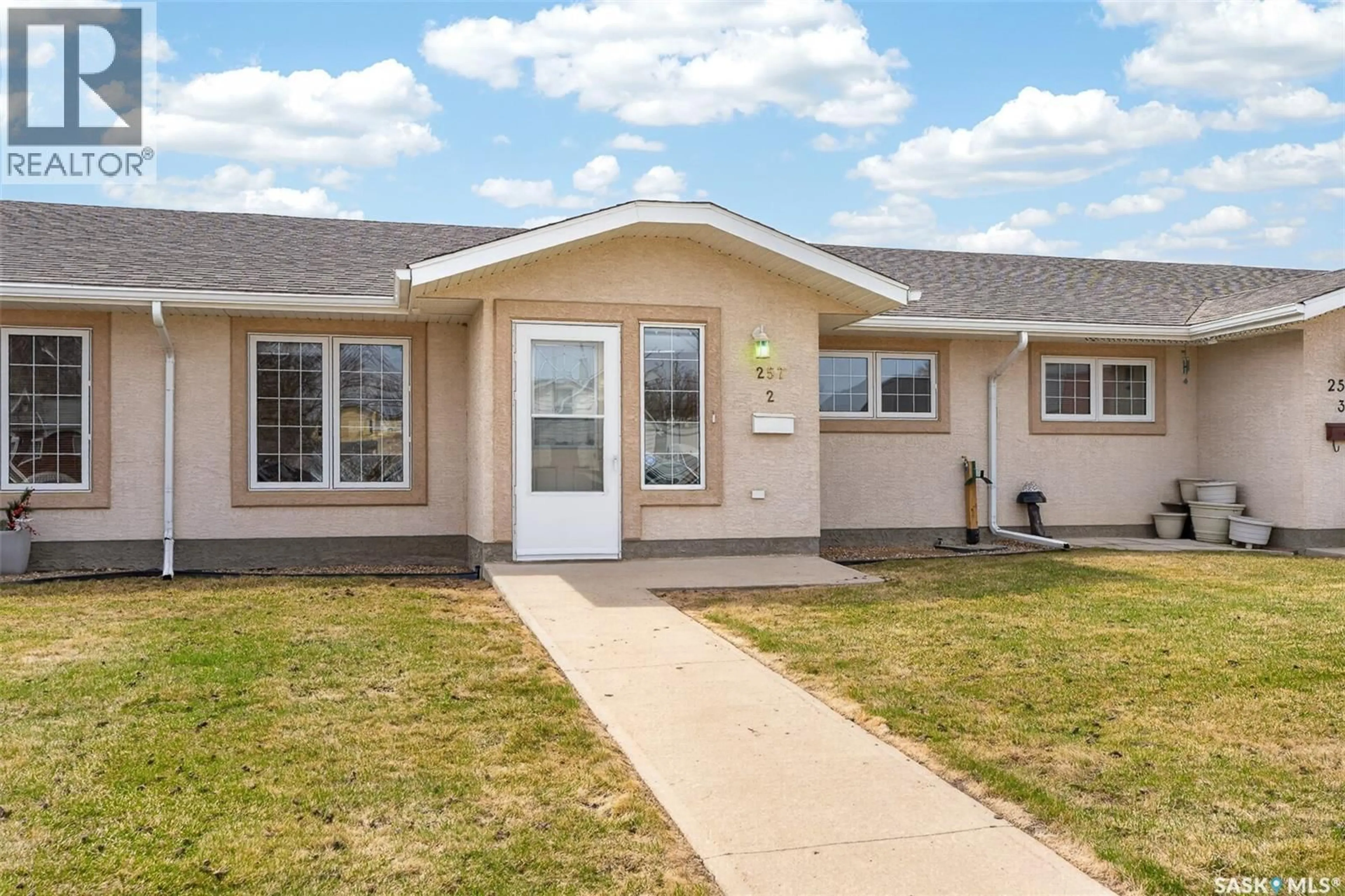 Home with vinyl exterior material, street for 2 257 FAIRFORD STREET W, Moose Jaw Saskatchewan S6H1V5