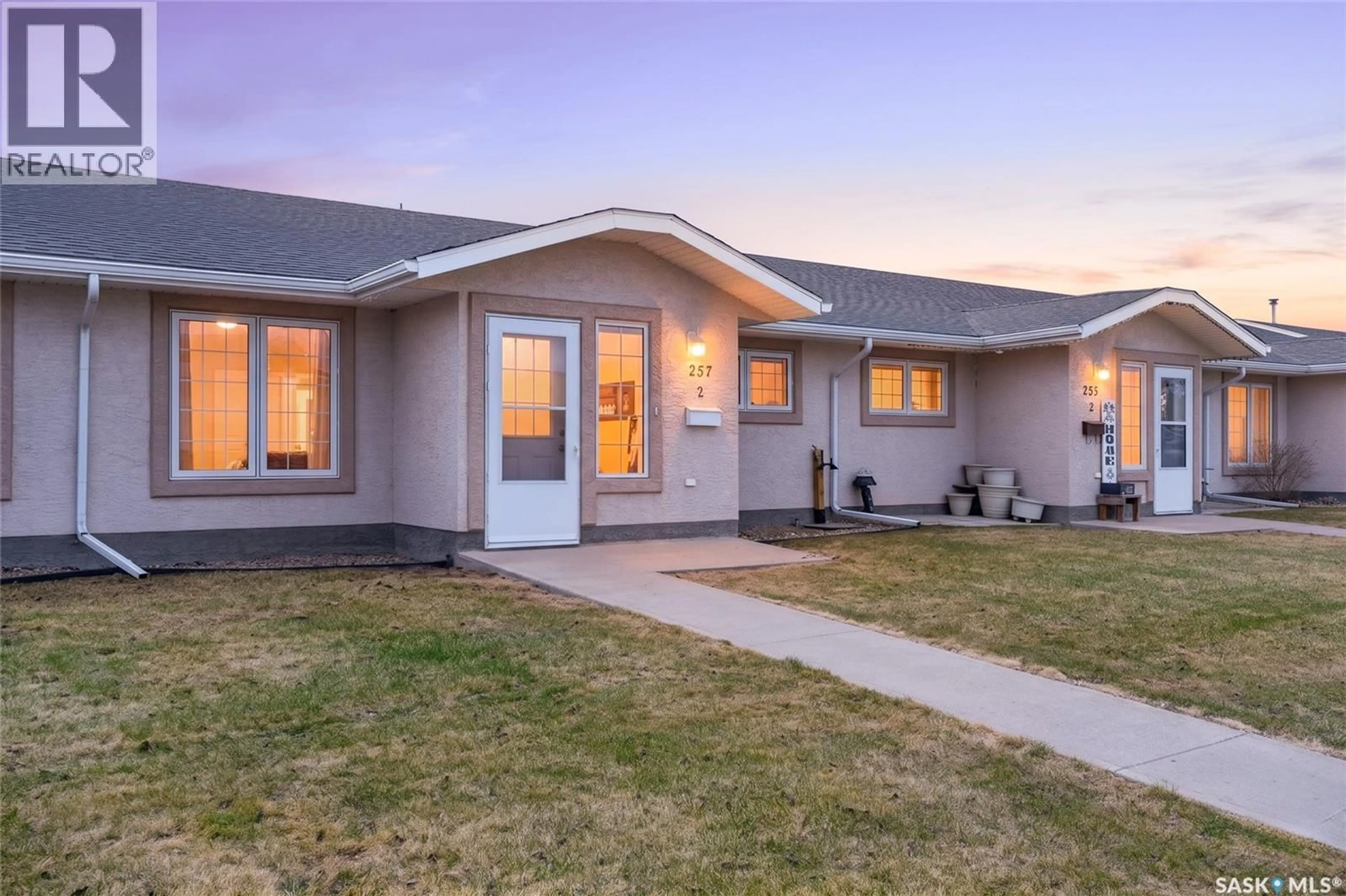 Home with vinyl exterior material, street for 2 257 FAIRFORD STREET W, Moose Jaw Saskatchewan S6H1V5