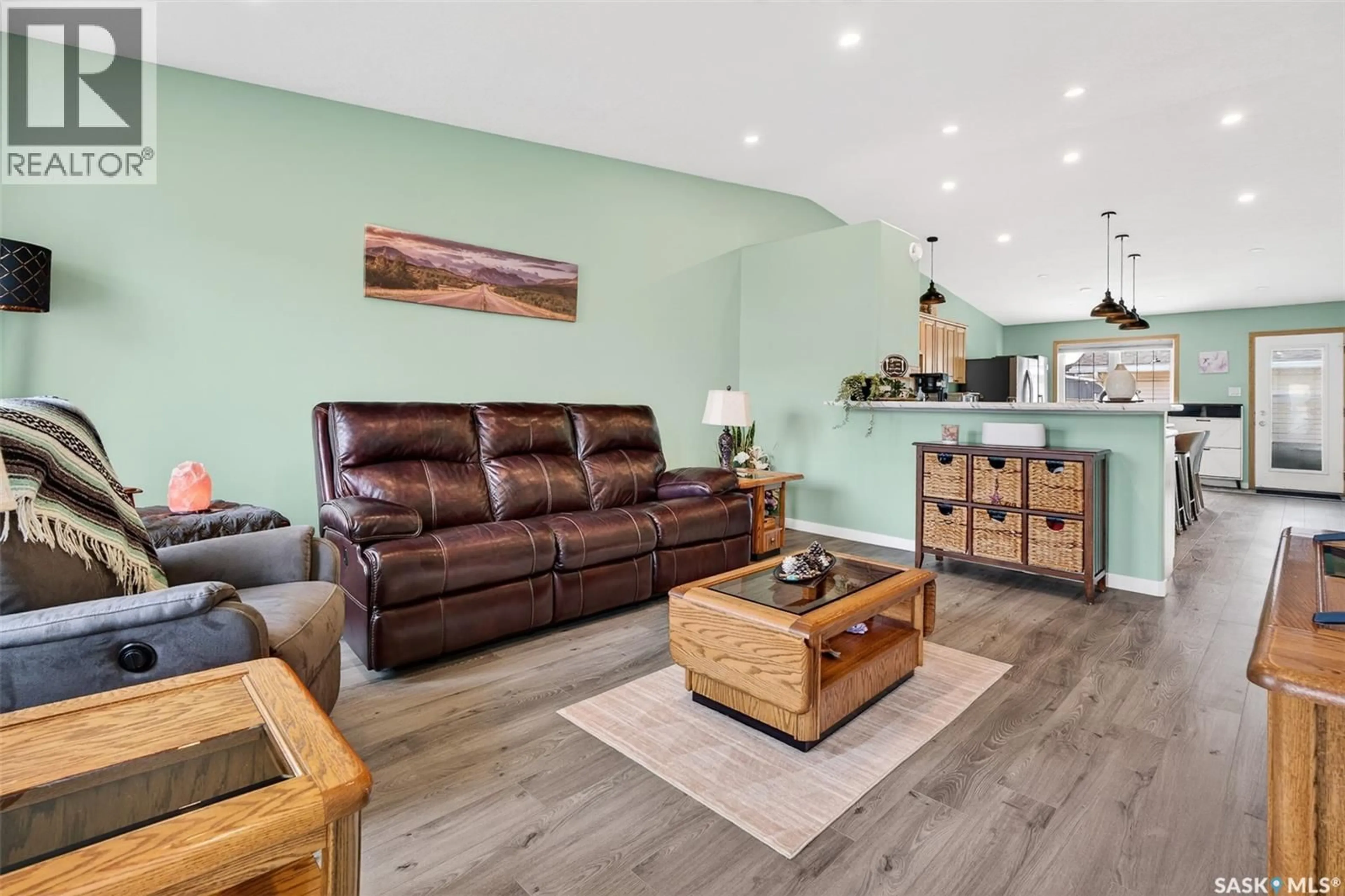 Living room with furniture, wood/laminate floor for 2 257 FAIRFORD STREET W, Moose Jaw Saskatchewan S6H1V5