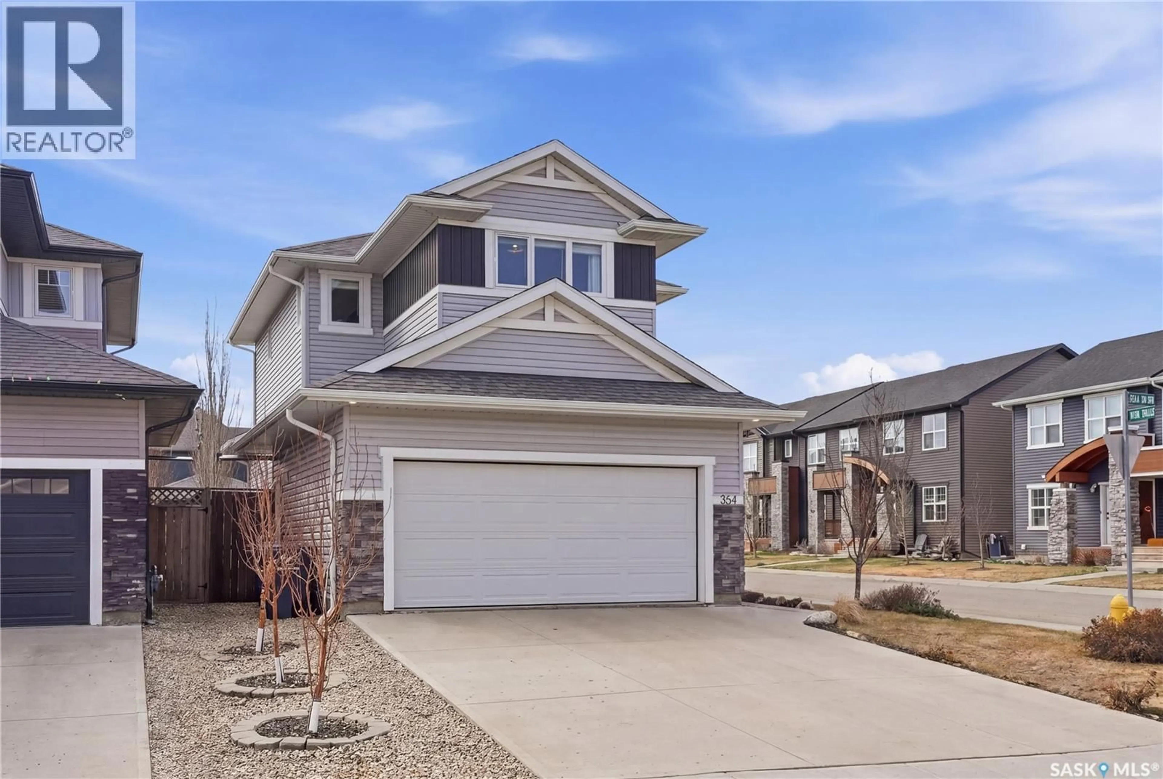 Home with vinyl exterior material, street for 364 UNDERHILL BEND, Saskatoon Saskatchewan S7V0N1