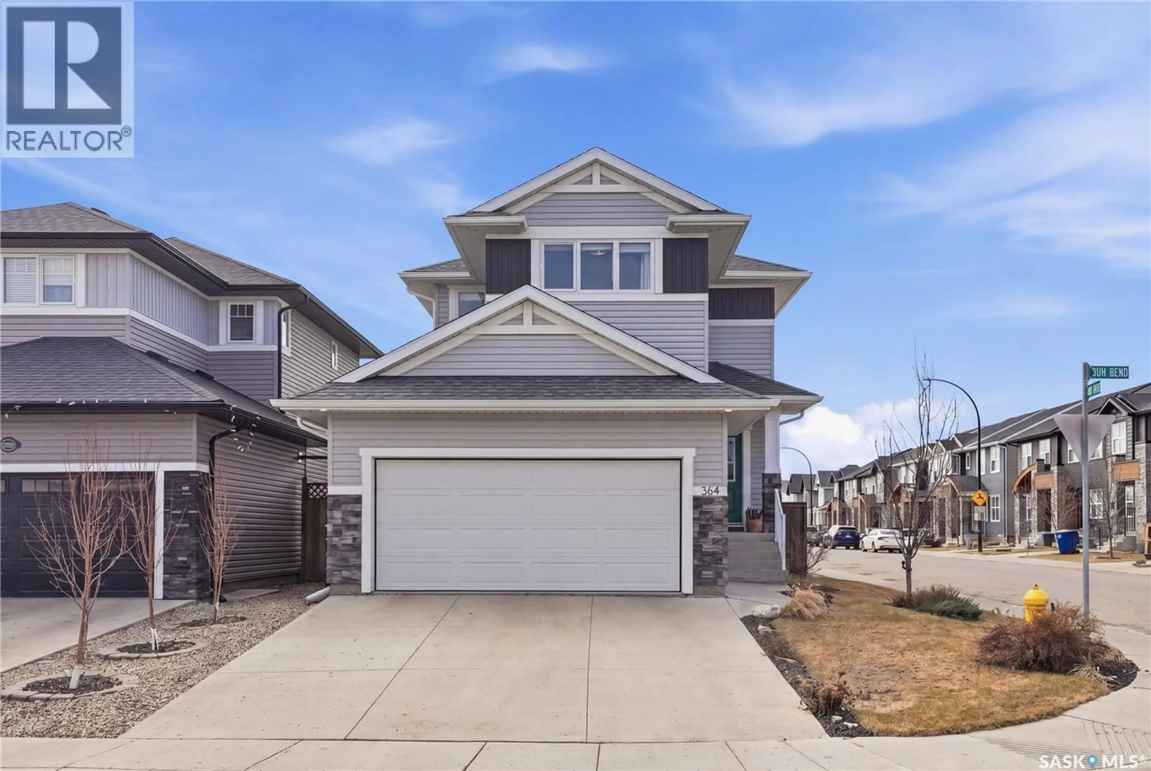 Home with vinyl exterior material, street for 364 UNDERHILL BEND, Saskatoon Saskatchewan S7V0N1