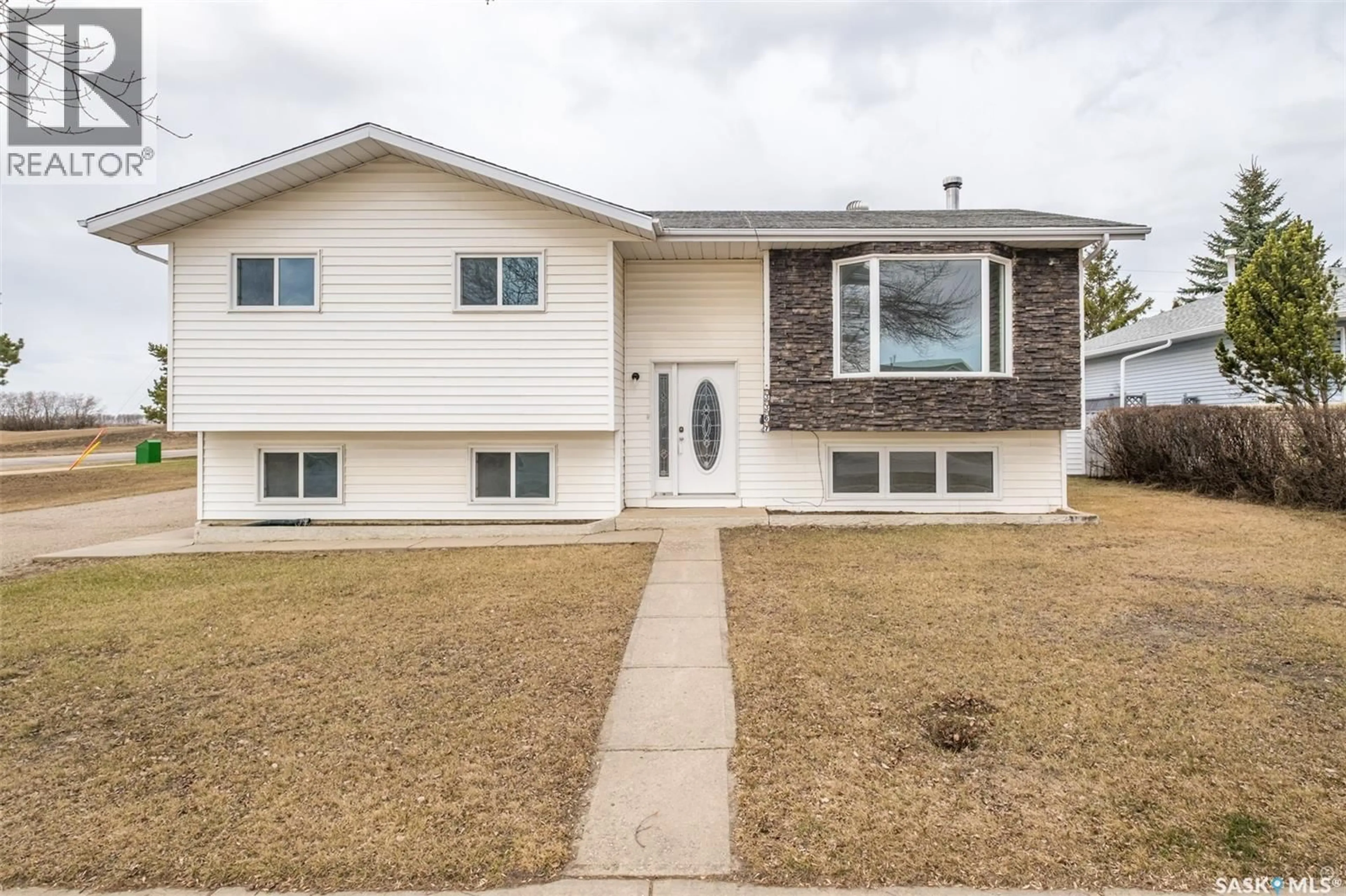 Home with vinyl exterior material, street for 3367 15TH AVENUE, Prince Albert Saskatchewan S6V7V3