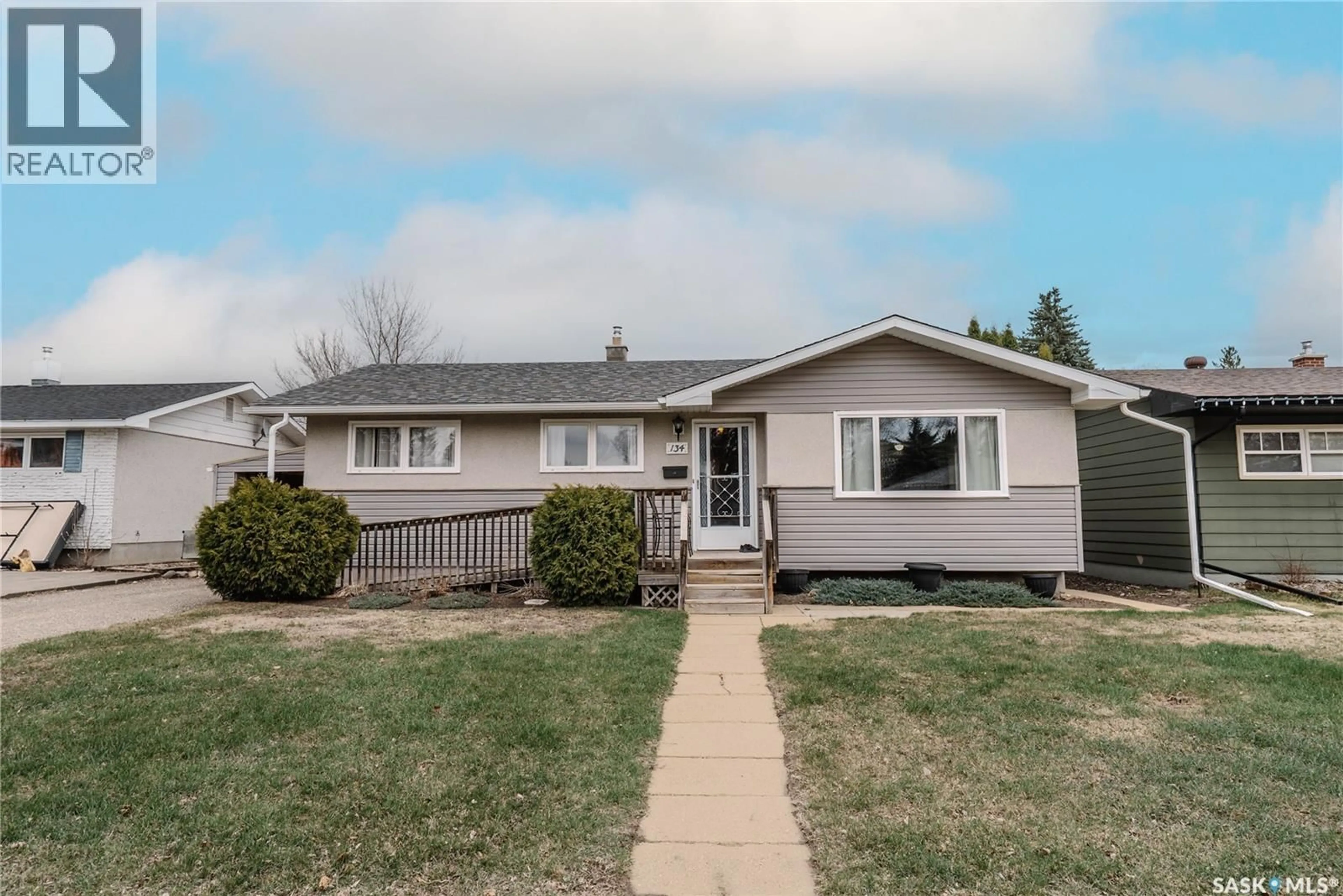 Home with vinyl exterior material, street for 134 MACLEAN CRESCENT, Saskatoon Saskatchewan S7J2R7