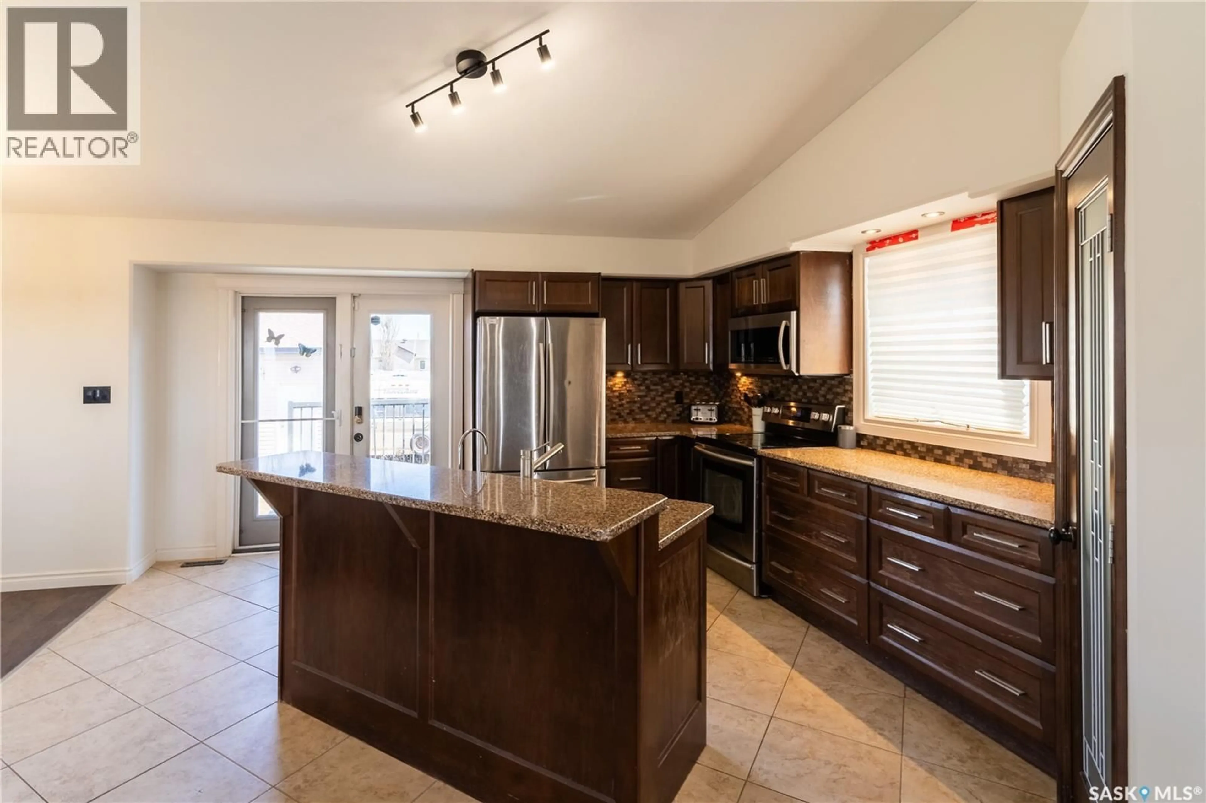 Open concept kitchen, ceramic/tile floor for 702 GOODRICH STREET, Radisson Saskatchewan S0K3L0